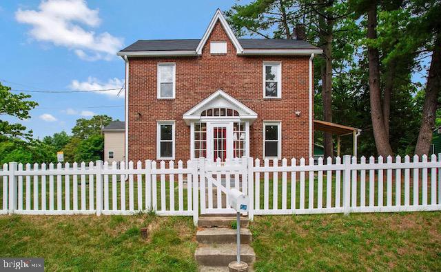 Welcome to 8700 Maple Ave, Bowie, MD 20720! A gorgeous renovated all-brick three-level single family home nestled in a flat corner landscaped lot in the heart of Bowie. The main level features an open layout renovated kitchen with quartz countertops, marble mosaic tile backsplash, plenty of modern cabinets, stainless steel appliances, a built in breakfast bar table with cabinet space, and pendant lights fixtures. Across the kitchen is the bright dining room overlooking the side porch and yard. The spacious living room on the left has a wood burning fireplace with a decorative textured marble mosaic tile and mantle. There is a full bathroom conveniently located in the main level at the end of the hall by the side entrance of the house. The upper level has a master bedroom with its full renovated master bathroom, two generous size bedrooms and a renovated hall full bathroom. The lower level is a walk out stair finished basement with ideal space for a rec room or gym. The house renovation includes new HVAC system, new water heater, new electric wiring and heavy up cable, new plumbing, new recessed lighting, new rigid core flooring, and fresh paint throughout. The corner lot is fully fenced with several mature trees. It has an outdoor barbecue pit for outdoor entertainment, one car garage with extra ample storage space, a driveway for 8 additional cars, and plenty of street parking. In addition, it has two convenient entrances: one from Maple Ave and another one from Lanham Severn Rd. Close to public transportation, schools and shopping. A must see!!!