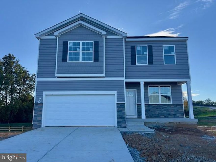 END OF NOVEMBER DELIVERY!!!!     Welcome to Riverpointe, Charles Town’s newest community! This beautiful two-story Colonial offers 2,148 sq. ft. of well-designed living space with 4 bedrooms, 2.5 baths, and a 2-car garage.
The open-concept main level features 9-foot ceilings, a spacious family room, and a modern kitchen complete with stainless steel appliances, quartz countertops, and a large corner pantry—perfect for everyday living and entertaining.
Upstairs, the primary suite is filled with natural light and includes a walk-in closet plus a private bath with dual vanity. Three additional bedrooms provide plenty of space for family and guests.
The lower level, walk-out basement is partially finished with carpet ready for those loving sports. Make this your theatre tv room.  There is also a rough-in for future bath and egress window. 
Enjoy a fully sodded yard, ready for outdoor fun, along with a prime commuter-friendly location just minutes from Northern Virginia, Maryland, and DC. Restaurants, shopping, and parks are all nearby for added convenience.
With its thoughtful layout, stylish finishes, and move-in ready appeal, this home is waiting for you. Schedule your tour today!