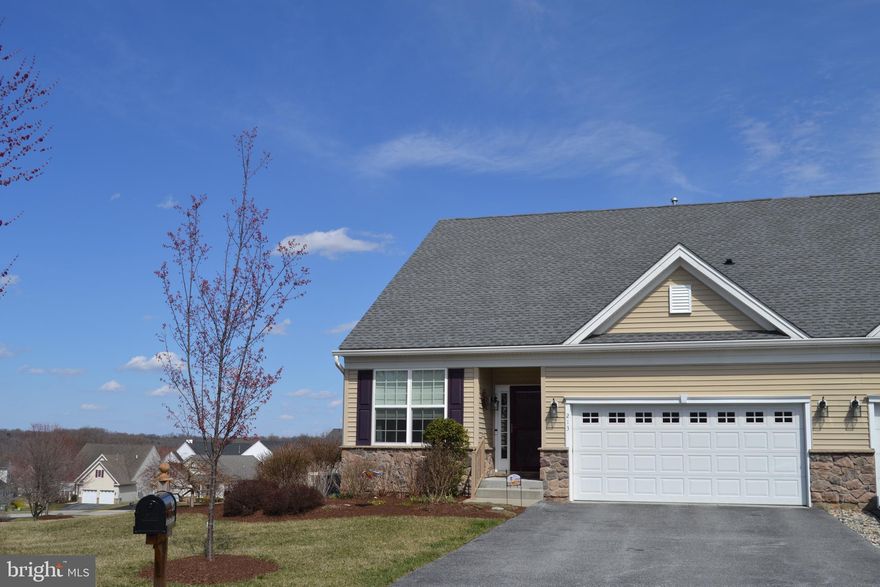 LIVE LIFE ON VACATION while living in your dream home in The Villages at Hillview, Chester County's premier ACTIVE ADULT COMMUNITY with unbeatable amenities and awesome neighbors.  This stunning Washington model boasts 3 bedrooms and 3 full baths and is nestled in a quiet cul-de-sac with awesome long views.   While this home provides true one-floor living, there is an added bonus of a finished walk-up basement with an expansive living area, which includes a full bath, as well as abundant storage for all the things you just couldn't leave behind when you downsized.  Let's start from the beginning...The front storm door, with a self-storing screen, has been tinted to reflect harmful UV rays.   As you enter the foyer, to your left is the guest bedroom with a door to the guest bath.  This sundrenched front-facing room is conveniently located for an alternate use as an office, den or studio - you decide.  The bath can also be accessed from the hallway to serve your visitors.  The formal dining room is "flexible space" to use as you please, but it makes a great expandable dining area for larger gatherings for a meal & stimulating conversation.   As you enter the heart of the home--the 'great room' that consists of the kitchen with a breakfast nook overlooking the family room--the first thing you notice is the open floorplan blending the separate areas into one warm and welcoming space.  The modern kitchen, featuring granite countertops & a breakfast bar, flows seamlessly into the dining nook where you can enjoy your morning joe, or move to your deck for "food with a view".   Next, you’ll find the inviting family room with its gas fireplace & included wall-mounted TV with sound bar.  From there you'll enter your freshly painted primary suite with walk-in closet & attached, tiled bath with a spacious shower & a beautiful clear, sliding shower door. The finished lower level provides many options, including as the 3rd bedroom, with its walk-up stairs to the back yard, several separate spaces and a full bathroom.  The spacious unfinished area houses your utilities & has shelving for all your special storage items.  This exceptional community is brimming with myriad amenities designed to enhance your lifestyle.  Stay active on the courts playing tennis, pickleball or basketball, or in the state-of-the-art FITNESS CENTER, complete with SALTWATER indoor & outdoor pools & spa. HILLVIEW RESIDENTS enjoy all 5 unique amenity buildings along with a community garden; and a shady PICNIC GROVE at the CABIN (with a Bocce court, horseshoe pit & picnic tables). Other special Hillview features include our helpful on-site management team with offices in the Lodge. The LODGE is also home to the Hillview LIBRARY & stunning gathering room, a meeting room, kitchen and a wrap-around porch.  The two-level CLUBHOUSE has a ballroom, a full catering kitchen, a stage for live performances, and an elevator to the lower level with separate rooms for cards/board games, crafting, and billiards & shuffleboard.  The COTTAGE & CABIN are original farm buildings that have been repurposed to further enrich the Hillview experience.  Whether you’re looking to join a book club, community garden, take a fitness class, simply relax by the pool, or find a great restaurant to dine with neighbors and friends, Hillview has it all.   Throw away your mowers & snow shovels...the HOA takes care of everything for you & even clears snow right up to your front door...Just move in & make friends. With easy access to local shopping, dining, golf, and medical facilities, you will find that Hillview is a great location for providing for your social, medical, shopping & gastronomical needs.