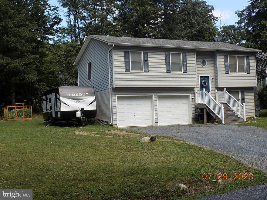 Well maintained 3 BR 2Bath Split Foyer located on 1/2 acre partially wooded lot. Nice rear deck. 2 car garage. Not far from front entrance of Mountain Falls Park. Pellet stove conveys. Upright freezer in lower level does not convey.