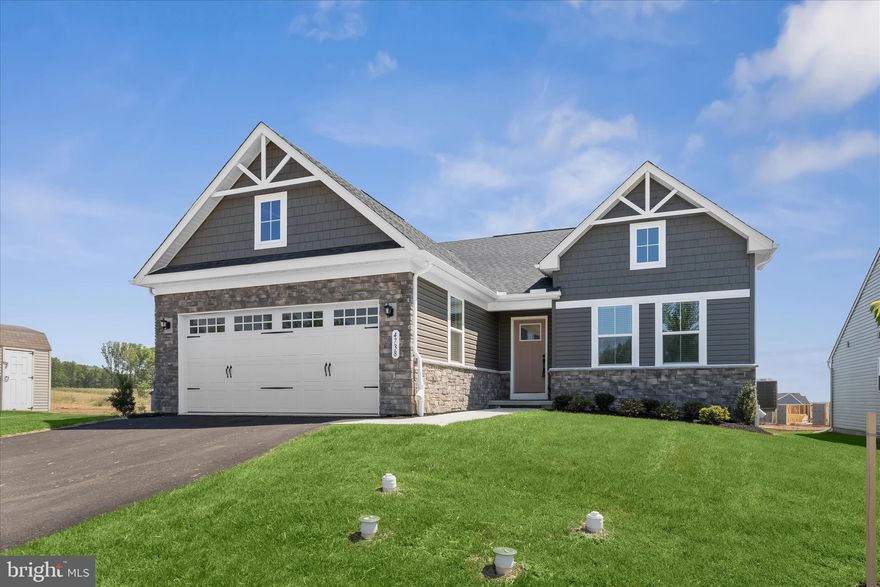 Find easy living at Grace Woods, a vibrant new 55+ active adult community designed for comfort, style, and connection. Built in 2024 by Ryan Homes, this impeccably designed ranch-style Eden Cay model offers three bedrooms and three bathrooms. Enjoy the ease of having everything you need on the main level, with a basement that expands the living spaces. Exemplifying luxury and elevated living with the perfect blend of modern convenience and timeless charm, with thoughtfully designed spaces to support your lifestyle today, and tomorrow. From the moment you walk through the door, you are greeted by an open-concept layout that invites natural light to flow throughout the home. The living room features plush wall-to-wall carpeting, creating a warm and welcoming space for relaxing or entertaining guests. The adjacent eat-in kitchen is a standout, with elegant luxury vinyl plank flooring, quartz countertops, and stainless steel appliances. A central island provides plenty of workspace and seating, while the spacious pantry keeps everything within reach yet neatly tucked away. The dining area has sliding glass doors that lead outside, perfect for adding on a deck or patio. Retreat to the luxurious primary bedroom suite that has been thoughtfully designed with comfort in mind. You will love the massive walk-in closet, while the private en suite bathroom includes a walk-in shower with a bench, and a dual-sink vanity. Two additional bedrooms on the main level offer flexibility for guests, a home office, or creative pursuits. A full hallway bathroom with a tub-shower serves these rooms. Completing the main level is a large laundry room and access to the two-car garage. Downstairs, the finished lower level adds even more room to spread out with an expansive recreation room that can accommodate large gatherings and everyone’s activities. Also located on this level is the third full bathroom, and a large unfinished utility/storage room with the potential to finish to your needs, whether a workshop, fitness room or hobby space. Grace Woods is more than a neighborhood, it’s a lifestyle. Community amenities include a clubhouse for social gatherings, fitness center, pickleball courts, beautifully landscaped outdoor spaces and more that offer residents ample opportunities to stay active and connected. Whether you are socializing with neighbors or simply enjoying the peaceful surroundings, there’s something here for everyone.  Located just minutes from Aberdeen’s shopping, dining, and entertainment options with easy access to major routes including I-95, top medical centers, and all that nearby Baltimore has to offer.