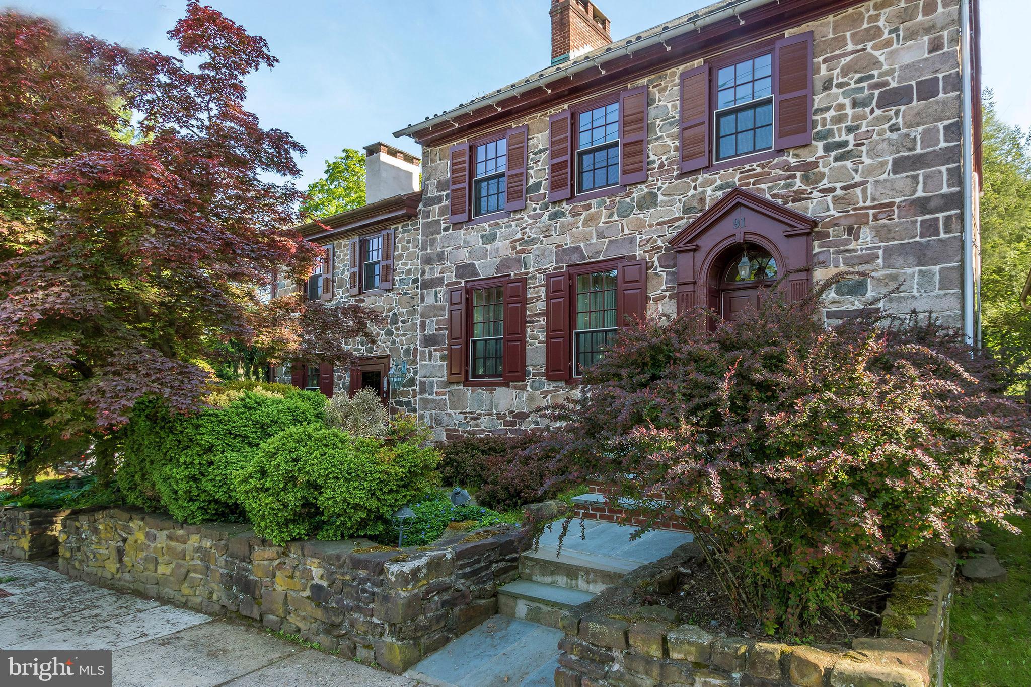 Enchanting Stone Federal Home in the Boro of New Hope, with it s own landscaped seclusion overlooking magical natural gardens surrounding the property. Off-street parking and a detached garage add to the joy of living in town. The early section of the home is ca. 1790 with 2 later additions which blend perfectly.Enter into a beautiful wide entrance hall with gracious staircase to upper floors, and off the hall, the living room with corner fireplace and a large formal dining room to complete this level. Down 3 or 4 steps into the earliest section of the house is the Great Room where most of the living is done. The wonderfully appointed and attractive kitchen at one end, with large center island and stone fireplace, and the sunroom at the far end with 3 walls of floor to ceiling windows, opening out to the large deck where much relaxing is done all summer long. Also off the Great Room and Kitchen is a step down into a small office and half bath.On the second floor is the large Master bedroom with fireplace, a newly designed Hall bath which also services another lovely bedroom. A winding staircase from the second bedroom, takes you down to yet another level and another stunning bedroom, large full bath, and a walk-in closet. There is also a small pie staircase leading down to the kitchen from this bedroom. From the upstairs hall, a closed door opens to another staircase to the attic room which is beautifully finished into the 4th bedroom. This is a most desirable in-town property, located in walking distance to all the restaurants, shops, and theatre, and if you are a reader, very close to the Library.