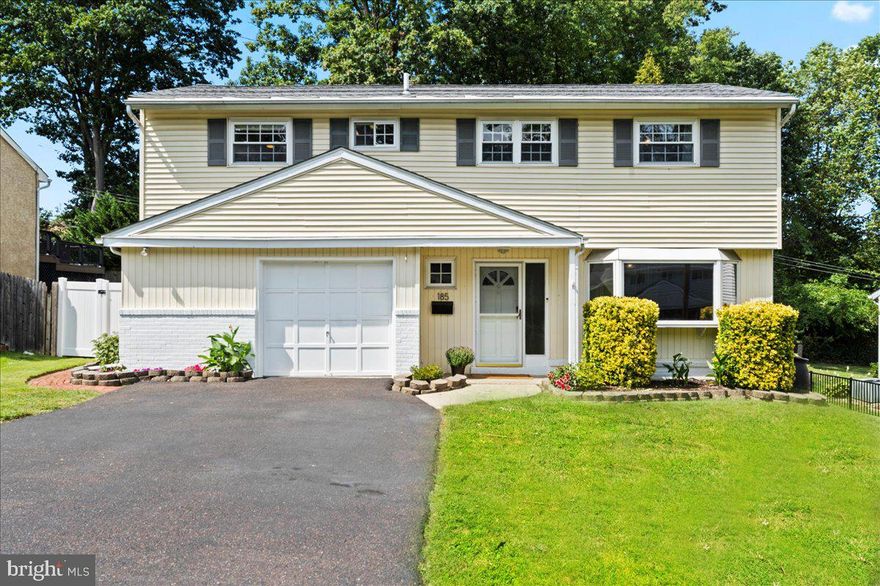 Welcome to this lovely split-level colonial home! This property is the perfect combination of charm and comfort. As you walk through the front door, the warm wood floors greet you. On the right is the spacious and bright living room that can be used as a home office, den or playroom. Off to the left is the powder room. Up the stairs you’ll find the family room with vaulted ceilings, skylights and a wood stove that opens into the dining area and kitchen. This open floor plan is perfect for entertaining and modern living. The new, large patio door off the family room leads out to the spacious patio in the private fenced in back yard. The updated kitchen features white panel cabinets, Corean countertops, and stainless appliances. Adjacent to the kitchen is the laundry room and mudroom that leads to the garage, as well as access to the back yard. The upper level boasts wood flooring, three spacious bedrooms and a full bathroom. The backyard includes a large patio and vegetable garden. Conveniently located near the turnpike, 611 and 263, yet tucked away in a quiet, desirable Upper Moreland Township neighborhood!