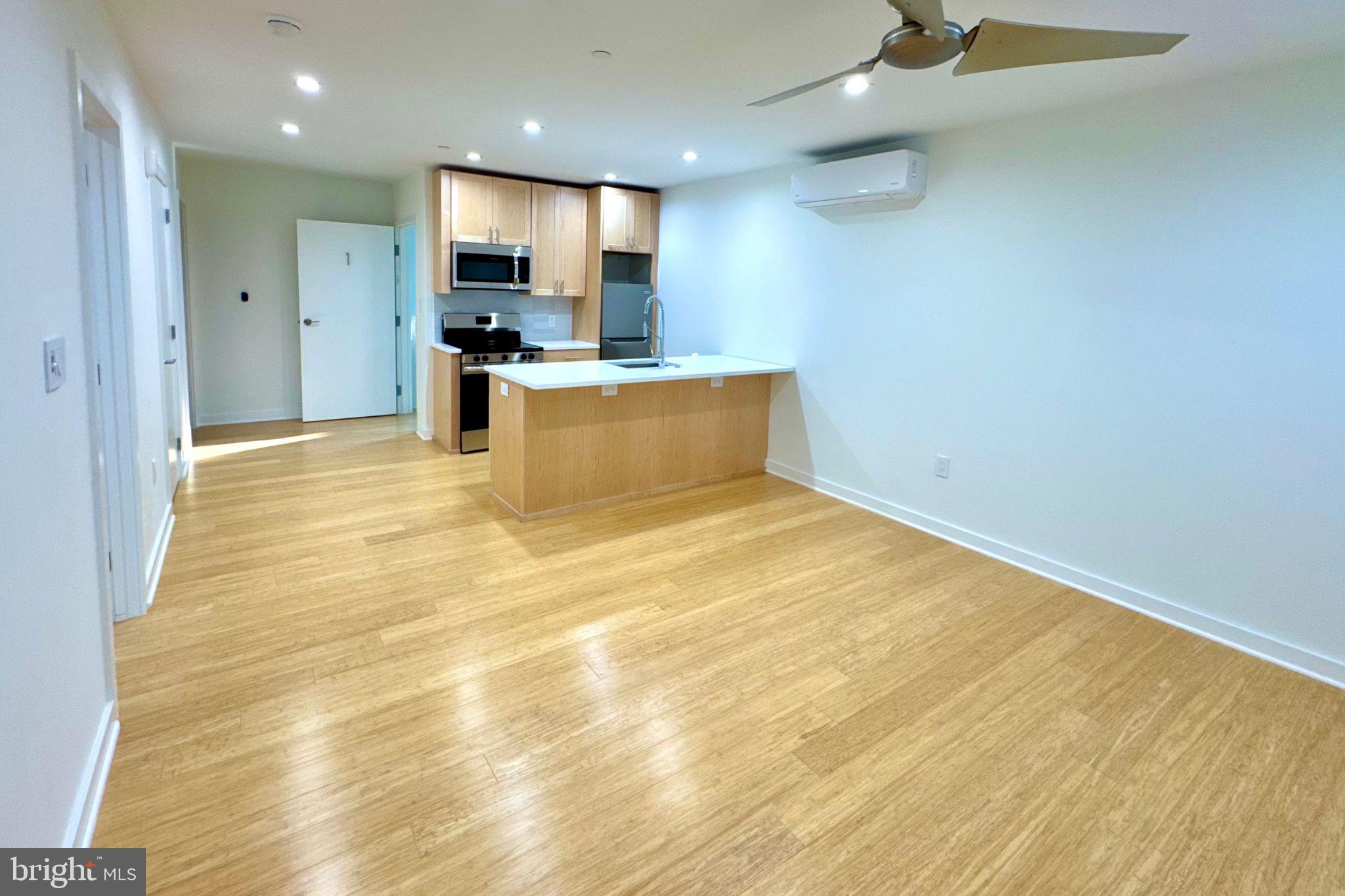 Be the first to live in this bright, brand-new 1-bedroom, 1-bath apartment located between Point Breeze and Newbold. With high ceilings and an open-concept layout, this thoughtfully designed home blends contemporary style with everyday comfort. The sleek kitchen features stainless appliances, quartz counters, subway tiled backsplash and a breakfast bar for casual dining, opening seamlessly into the living area—perfect for entertaining or quiet nights in.
The bedroom offers generous closet space and large windows that bring in tons of natural light. A warm, modern bathroom, in-unit laundry, and ceiling fans in both the living room and bedroom add to the home’s comfort and convenience. Pet-friendly, too.
Set in a rapidly growing part of South Philly, you're just steps from local favorites and exciting new spots—including a yoga and Pilates studio, Schmaltz, Groom and Board doggy daycare, Rowhouse Grocery, and Luhv Vegan Bistro—plus longtime staples like American Sardine Bar. With easy access to the Ellsworth-Federal and Tasker-Morris BSL stops, Center City is just minutes away.