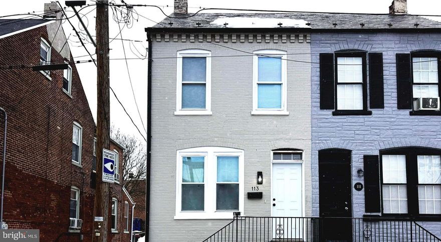 Nestled in a charming neighborhood, this exquisite end-of-row townhouse, built in 1900, seamlessly blends historic elegance with modern comfort. The well-appointed kitchen, while ready for your personal touch, offers ample space for culinary creativity. Imagine preparing gourmet meals while enjoying the company of loved ones in the adjoining dining area, where memories are made over shared meals and laughter. This home features four bedrooms and two bathrooms.. The possibilities are endless, allowing you to tailor this area to suit your lifestyle. Step outside to discover the quaint outdoor space, perfect for enjoying morning coffee or unwinding after a long day. The low-maintenance lot allows you to spend more time enjoying your home and less time on upkeep. Parking is a breeze with convenient on-street options, ensuring that you and your guests always have a place to call home. This property is not just a house; it's an invitation to a lifestyle filled with charm and character. Experience the perfect blend of historic allure and modern convenience in this delightful townhouse, where every corner tells a story and every moment feels like home. Embrace the opportunity to create lasting memories in a space that truly reflects the essence of comfortable living. More photos coming soon.