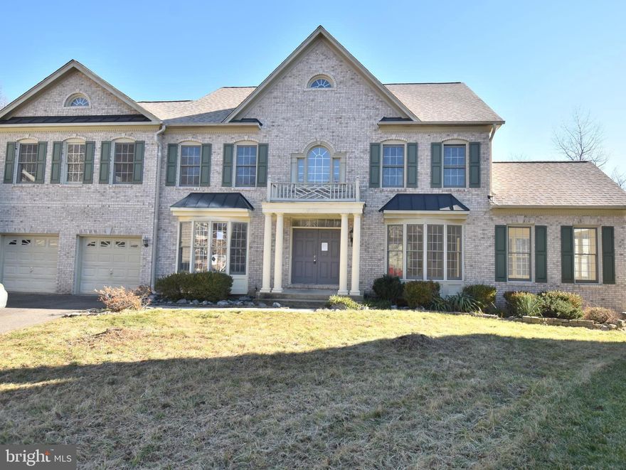 Massive 4 level brick front Colonial located in the gated Oak Creek Club community.   The main level is open and spacious with a home office, morning room and breakfast room additions, and step down family room with a floor to ceiling brick fireplace.  The second level boasts 5 bedrooms and 3 full bathrooms highlighted by a massive primary suite.  There is a bonus third level with a game room, bedroom and full bathroom.  Completing the interior is a finished lower level highlighted by a gigantic recreation room, bedroom and full bathroom.  The home is sited on a cul-de-sac and backs to trees and woods.  This community is loaded with amenities including a golf course, restaurant, community center, tennis courts, swimming pools, playgrounds and so much more!
