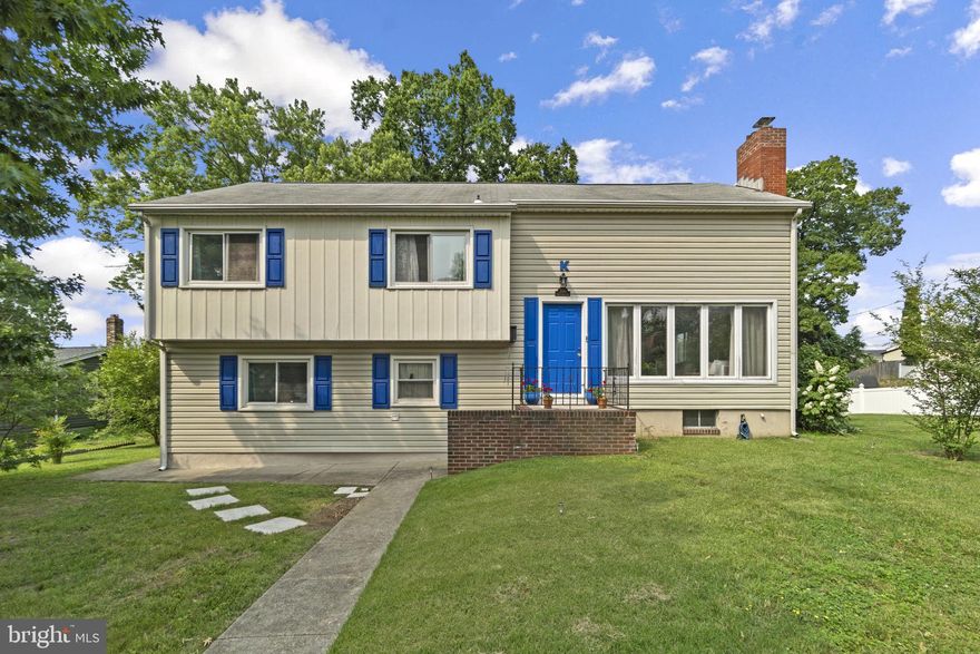 Welcome to 206 Mountain Rd, one of the most impressive homes to come on the  market in a generation in Linthicum Heights. Features five/six bedrooms, three full baths. This spacious home includes possible ADU/office/student suite. Step inside the main level and you're greeted with golden oak hardwood floors, fireplace with tiled hearth, big sunny windows. Dining room boasts modern chandelier and steps out onto 12’ by 21’ deck, overlooking organic garden, fruit trees, big original/ specimen trees, and plenty of room to play. The updated designer kitchen includes stainless steel appliances, open shelves, back splashed walls graced with tiles. The first upper level has three bigger bedrooms with hardwood flooring and windows that look out on trees and garden. A full bathroom with updated vanity, shower tiling, classic wall and floor tile rounds out this level. The second upper level is lovely primary bedroom with hardwood floors, walk-in closet and its own full bath. This bedroom comes with window AC, and perfect for ductless mini-split. Full attic space shows lots of storage, with possibility to finish for your creative use. The first lower level, (all above ground,) features bedroom five, with Brazilian walnut floors and a private side entrance for an optional ADU/office/potential 6th bedroom, plus a big laundry room with appliances and sink, and stunning updated full bathroom with tiled shower and floors which round out this level. The basement features 10 foot ceilings, with 400sf+, big bright painted workshop, man cave or recreation room. Already sports french drain and sump pump. Utilities include newer water heater, gas furnace, central air conditioning. This space is very large and light. The home features vinyl replacement windows throughout. The neighborhood has amazing Overlook Park featuring ball field, basketball court, dog park, tennis court, trails, picnic area and playground, only a few blocks away. Also situated super close, a walk away to Light Rail, plus easy driving access to 695, 895, 295, 97, 95. A perfect location to commute to Baltimore, Washington, anywhere in Maryland, or further points on East Coast. Amtrak connects, BWI flies you anywhere. Convenient to major hospitals including Johns Hopkins Hospital, and JH University. 206 Mountain Rd is a must see. Appreciate the sheer size and loveliness of this home, and the generosity of the additional half lot of cooling green space. Schedule your appointment today and make this home yours!