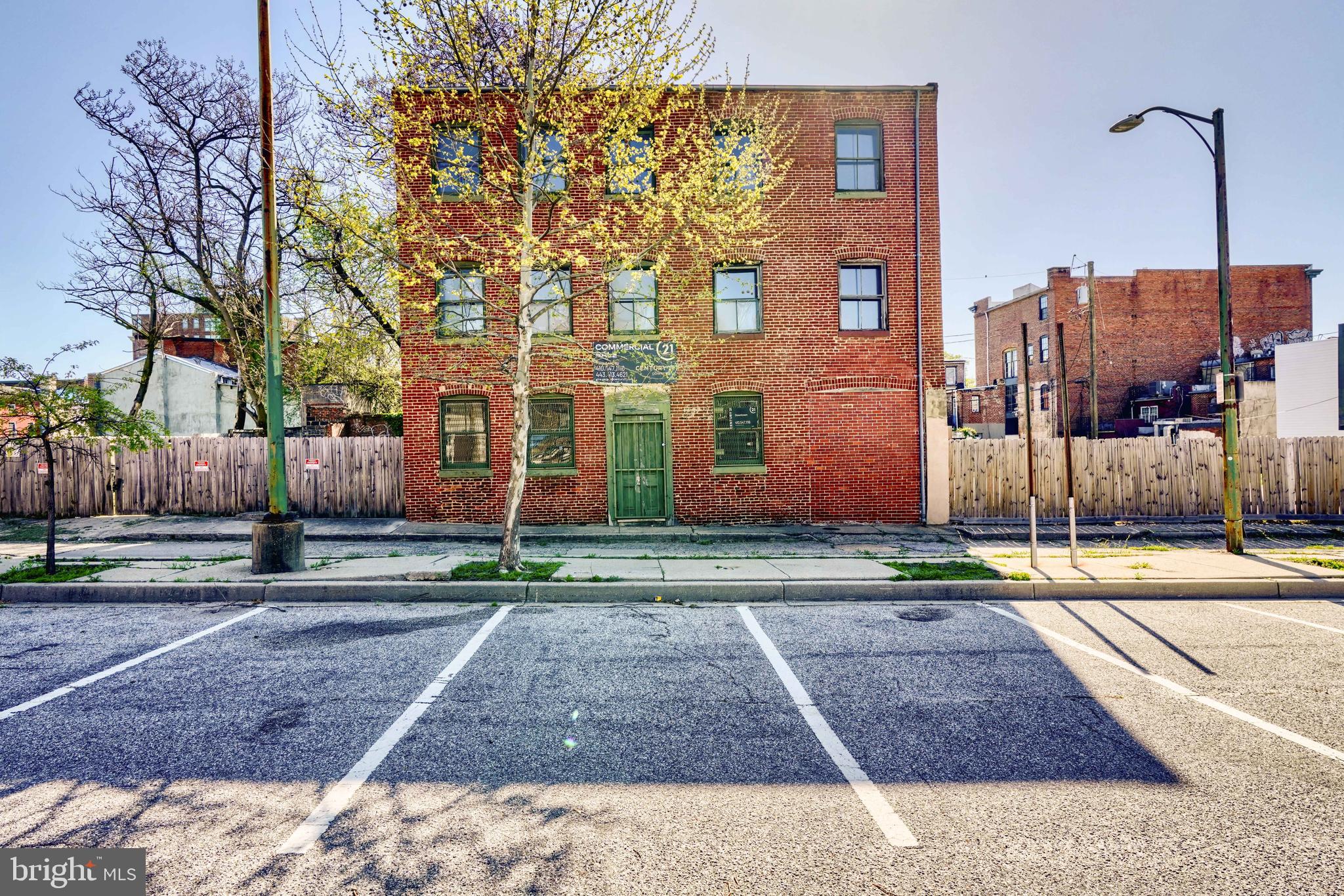 Nestled in the heart of the revitalized Hollins Market neighborhood, this exceptional parcel presents a rare opportunity in one of Baltimore City’s most dynamic areas. Located just half a block north of the newly renovated Hollins Market, the offering includes a spacious warehouse encompassing approximately 8,000 square feet, along with 23 S Carlton Street, and the possibility of buying 1101 Booth Street, 1103 Booth Street, and a .02-acre lot directly behind 23 S Carlton. Altogether, the property spans a generous .26 acres, making it one of the largest available parcels in this sought-after location. The area has seen significant rejuvenation over the past year, enhancing its appeal for investment and development. With its versatility, this property is well-suited for a range of uses, including storage, a distribution center, residential conversion, or mixed-use development. Whether you are an owner-user seeking a prime location or an investor looking for a promising opportunity, this parcel offers immense potential in a rapidly growing neighborhood.