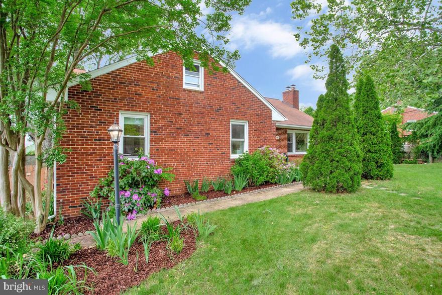 Beautiful brick rambler on a corner lot with a spacious, fenced rear yard. Gorgeous renovated kitchen with granite counters, soft-close cabinetry, a 5-burner gas stove, stainless steel appliances and truly a space for everything! Think multi-tiered pantry, dual built-in spice racks plus 11 drawers!  The deep sink overlooks the fenced rear yard, and the kitchen is open to the dining room. It's a chef's dream kitchen! Light and bright living room with 5 windows and a wood-burning fireplace Gorgeous oak floors throughout the main level! The primary bedroom has an ensuite bath and a LARGE walk-in closet. The two additional bedrooms share the hall bath with its tiled tub/shower.  The lower level has a spacious family room with 4 windows and a side exit to the yard.  There's an office with a pocket door, a half bath and a large laundry/utility area. There's also a walk up attic currently great for storage but with future potential for expansion! The back yard is your own private oasis. Plenty of room to plant and play! There's a deck with built-in counters for entertaining and a shed with power and room to tinker. Close to the flagship University of Maryland, just across the way from Greenbelt National Park with lovely hiking trails and close to Metro and bus stop! Fabulous community with lots of local events.  What a great place to call your own!