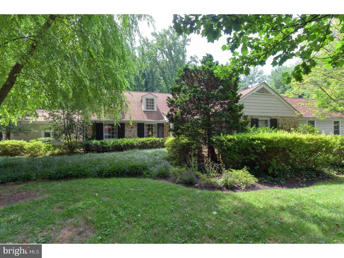 Enter pristine stone Cape Cod through spacious foyer with stone floor open to newly customized powder room! Gourmet kitchen offers large island with marble counter top with views to expansive patio that overlooks park like setting. Family room with wood burning fireplace with adjacent office space surrounded by lush green views from all windows! Totally renovated First Floor Master Bedroom with new windows, fabulous window seat and french doors that lead out to large sun deck! Adjacent spacious dressing area with renovated closets and fabulous glass shoe closet! Formal living room and dining room leads out thru glass doors to newly constructed covered loggia with beadboard mahogany ceiling complete with outdoor sconces and fans! Second floor offers three bedrooms with renovated bathroom complete with designer tile and new wood floors! New 2016 expanded garage with staircase to large storage area. New mud room with custom cabinet pantry! This is an inviting home with professional designer upgrades with great flow for entertaining! Walk to historic Gladwyne with specialty stores and gourmet market! Seller is a PA licensed real estate agent.