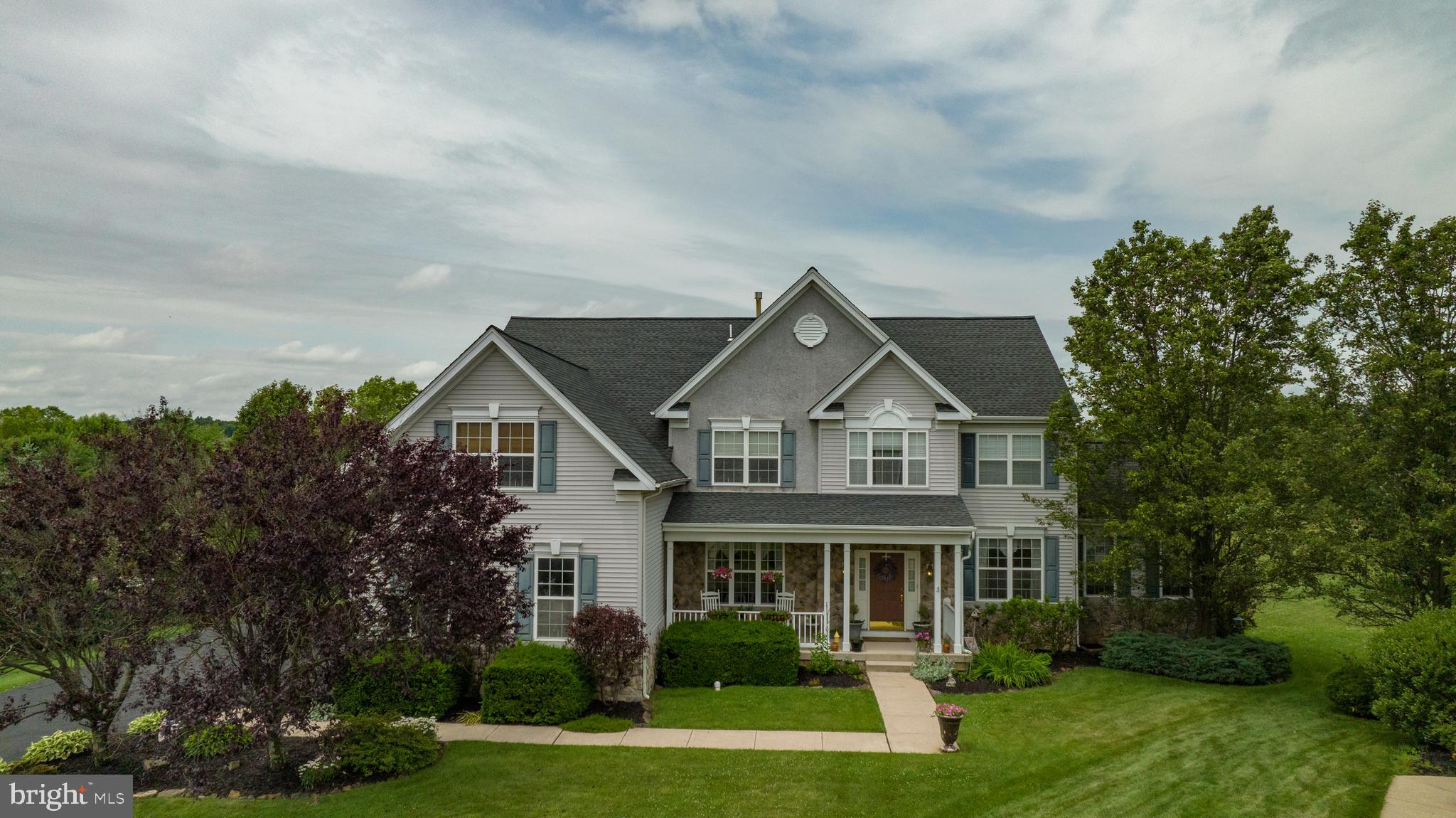 Welcome to 2163 Brookshire Road! This spacious 5 bedroom 4.5 bathroom home in the highly sought out community of Devonshire Estates is one of the few homes that backs to open space and offers a beautiful conservatory with lots of windows and  Bucks County farmland views.  From the moment you pull up to the home you will be impressed by the custom landscaping and lovely porch to greet family, friends and neighbors. When you enter the home you will be impressed by the hardwood floors throughout most of the first floor. The formal living room and dining rooms have custom moldings. The family room has a vaulted ceiling with a stone gas fireplace. The gourmet Kitchen with a large island has 42"cabinetry, upgraded appliances and a Butler's Pantry! First floor office​, powder room and laundry room complete the main level. From the kitchen you can take the back staircase to the upper level. There you will find the Owner's Suite that has a sitting area and a full bath with a Jacuzzi and oversized stall shower. Four additional bedrooms and 2 more full bathrooms complete the upper level. There is a  fully finished basement with an extra room that can be used as an additional bedroom or office, along with a full bathroom that is great for out of town guests. In the backyard there is a stunning custom paver patio with a pergola and stone walls that overlook the open space! All this is offered to you in the Award-Winning Central Bucks School District! Close to Doylestown, New Hope, Newtown and New Jers​ey. More photos coming!