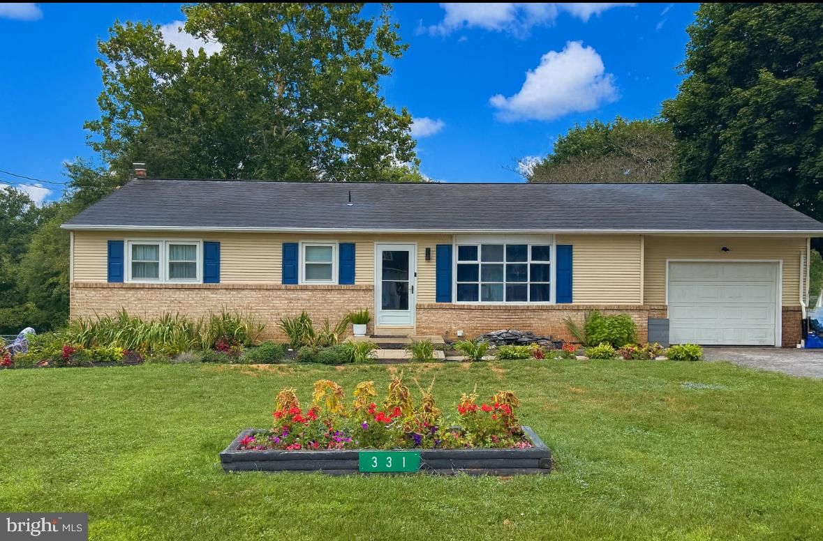 Great Opportunity in New Oxford! This charming rancher offers 3 bedrooms and 1.5 baths, perfectly blending comfort and convenience. Step inside to find a beautifully remodeled kitchen, a bright dining area, and a spacious living room. Crown molding adorns the living room, hallway and kitchen and new trim throughout! Property has freshly painted walls and ceiling! The partially finished basement adds even more living space with an office or 4th bedroom/guest room. You will also love a cozy family room featuring a fireplace—plus a walkout to the versatile backyard, ideal for entertaining, gardening, or play. Lots of storage. Huge deck out back! Koi pond and beautiful landscaping! Situated on a generous half-acre lot just outside of town, this property provides the best of both privacy and accessibility. Deck is being rebuilt!—don’t miss your chance to make this New Oxford gem your own!