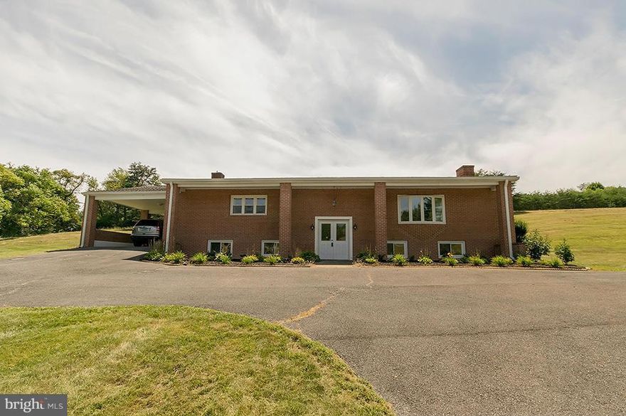 Farmette includes 10.86 Acres, 2 quality built brick homes + Barn. Live in one, rent the other. Main house is 3 BDRM + 3 full BA + carport, Guest house is 2 BDRM + 1 BA + garage - currently rented through 4/17. Unrestricted with beautiful pasture land all you will need to provide is fencing. Situated near Shepherdstown Pike. Beautiful property that is well maintained and move-in ready.