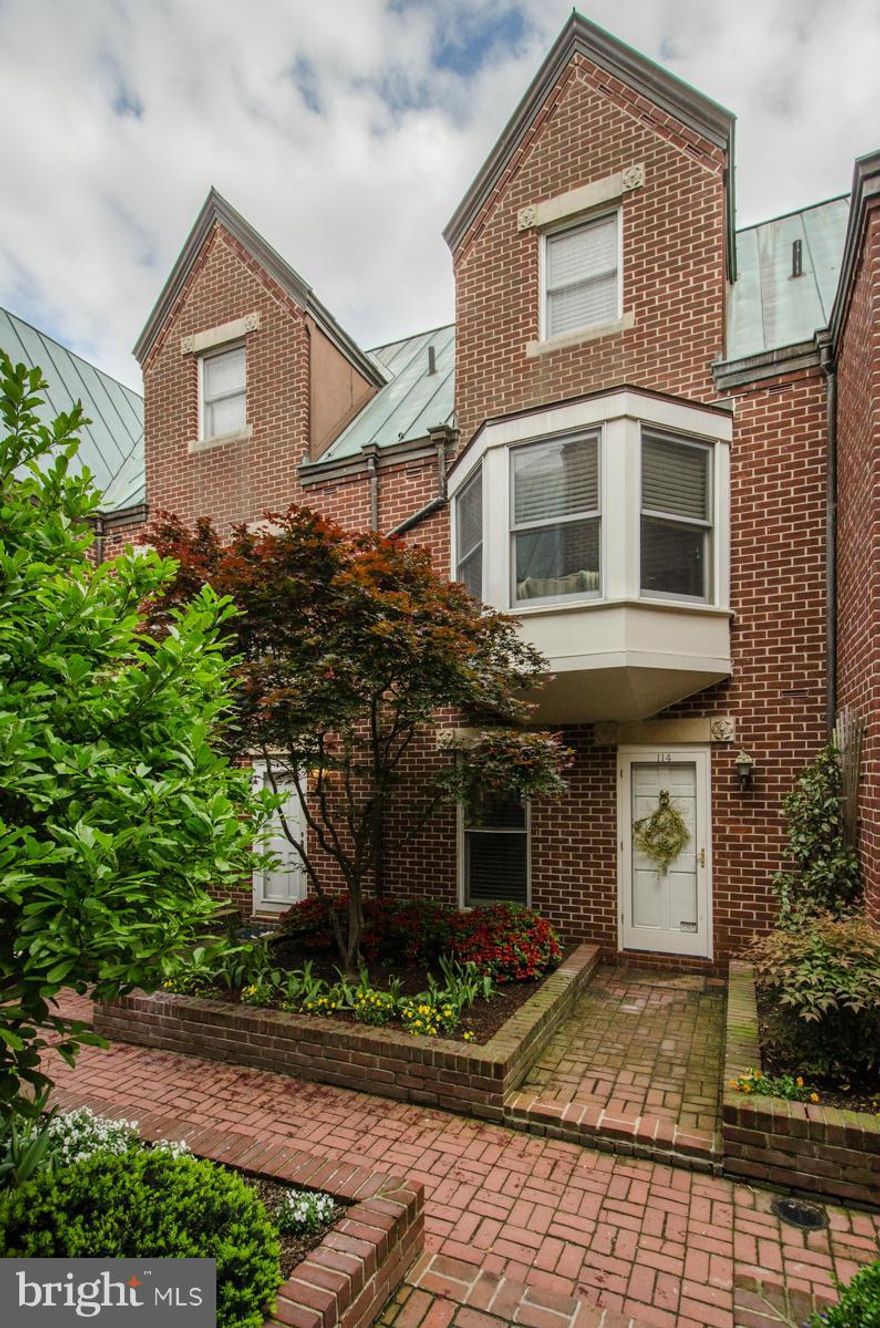 ENTER TORPEDO FACTORY FROM 100 BLOCK OF N. LEE STREET Old Town living with river views! Convenience and livability abound in this beautifully furnished 3 bedroom 3.5 bedroom townhouse in the most envious of OT locations - only one block from King Street and the Potomac River waterfront! Separate dining room, fireplace, hardwoods throughout, assigned garage parking! Secluded courtyard entranceway!