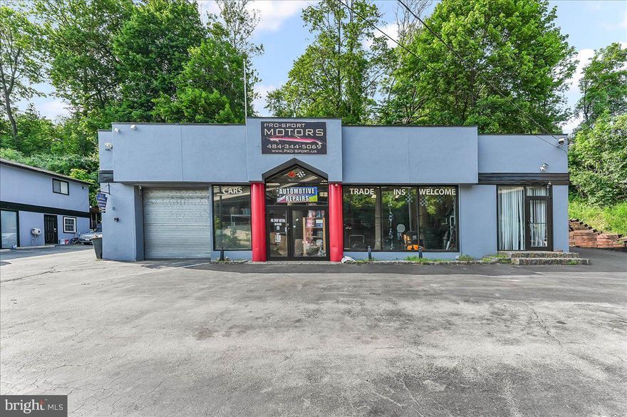 Fabulous opportunity - building #1  currently an auto  repair shop with overhead door and 3 repair bays with lifts and an office and powder room.  It is currently licensed as an Automobile Dealership.  Building #2 consists of 2 floors - first floor is set up with 4 plus offices, 3 powder rooms and could be reconfigured for multiple uses.  The second floor with separate side entrance is home to 2 - 2 bedroom apartments currently tenant occupied.  The complex has tons of potential - located on busy Matsonford Road - in its former life it was a kitchen and bath store, Antique and Classic car sales, a smoke shop, offices and has potential for many additional uses.  Located between the on/off ramp for the Expressway and Blue Routes it has terrific traffic flow.