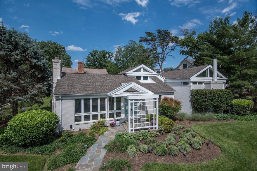 Stunning contemporary home in charming Hillmead. Fantastic floor plan: 4 big bedrooms, 3 fabulous full baths. Dynamic design! Wood floors, cathedral ceilings, walls of windows. Gourmet kitchen. Amazing master suite with den. Finished basement family room. Gardener's Delight! Lovely landscaping, rear patios, hot tub. Whitman Cluster. Mins to downtown Bethesda.