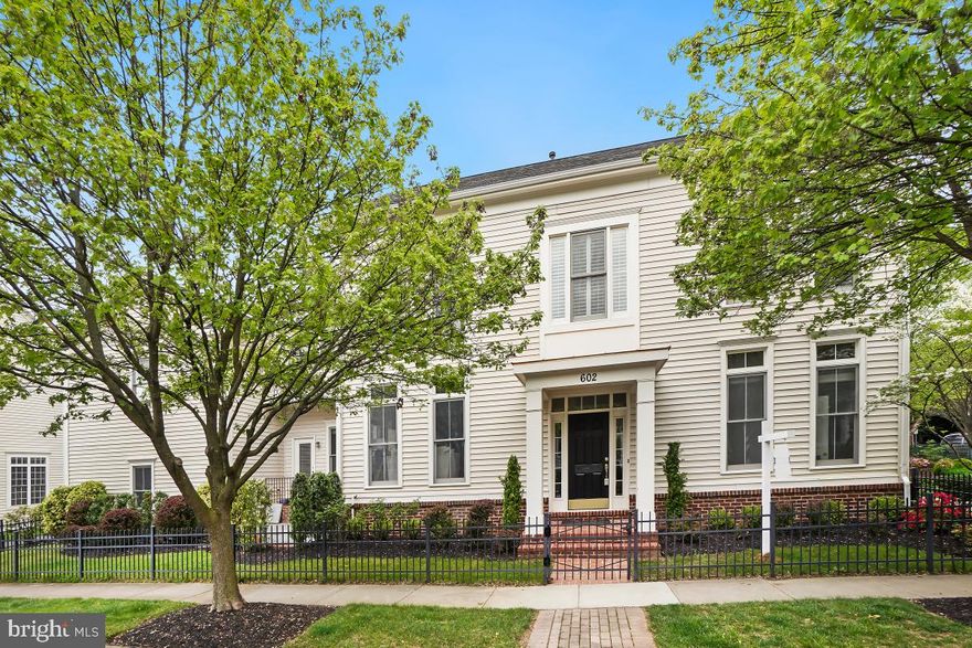 Due to multiple offers situation, Offer deadline is 12pm on April 29. Fabulous end-unit townhouse in prestigious community of King farm Watkins Pond. With its spacious layout, high ceilings, and convenient amenities, it is a wonderful place to live.  Total 4 bedrooms , 4.5 bathrooms and 2 attached double garage.  The master suite and  two other bedrooms  accessed from the front foyer. The second master suite separately accessed from kitchen.  The various features like open floor plan, grand foyer entry,  9 ft high ceiling , professional installed tesla charger in garage,  bright family room with build in book shelf,  open kitchen with granite counter top and upgraded appliances（new microwave, newer fridge and cooktop.   Large recreation room in finished basement with 1 full bathroom.  Harwood floor and ceramic tiles on the main floor. Carpet on the floor and basement. 3 zone HVAC (replaced in 2014, 2017 and 2023). Very energy efficient house with smart thermostats.    King Farm is a lovely community in Rockville conveniently located near Metro, ICC, I-270 and 355. 2 community pools, green space, two parks, a village center with grocery store, restaurants, banks, and shopping.  Free Shuttle to metro offers the ultimate convenience .  Walking distance to Shady Grove Metro,  one block away to shuttle bus stop. Do not miss!!