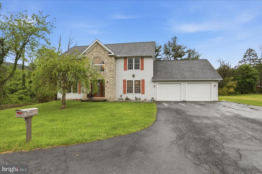 Located in the heart of LaVale  yet secluded and serene, this one has it all. This beautiful home features four bedrooms, 3 1/2 baths, a two car garage and sits on a level lot. Enjoy the two living rooms, outdoor space with a large deck off of the kitchen, formal dining room and finished basement.