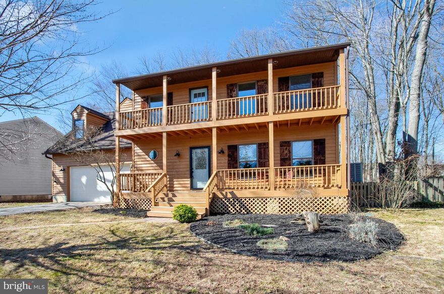 Beautifully maintained 4-bedroom, 2.5-bath home in the coveted Westelee neighborhood. This residence has everything you desire and more, including a spacious eat-in kitchen with a separate dining room, a main-level office, spa-inspired bathrooms, fresh paint, and new carpet. The upper level features a huge bonus room over the garage that can serve as a playroom or a potential 5th bedroom. Primary suite has a private balcony with gorgeous WATER VIEWS!   Outside, enjoy a large private deck and a fenced-in yard, perfect for entertaining. Additionally, the oversized attached garage offers ample space for both parking and projects. Take advantage of the voluntary community association, providing access to a private beach, playground, pavilion, and pier for only $65 a year!  Boat slips and kayak racks can also be rented out thru the Association.  Or purchase a private membership at Chesapeake Yacht Club, which is located in the neighborhood!