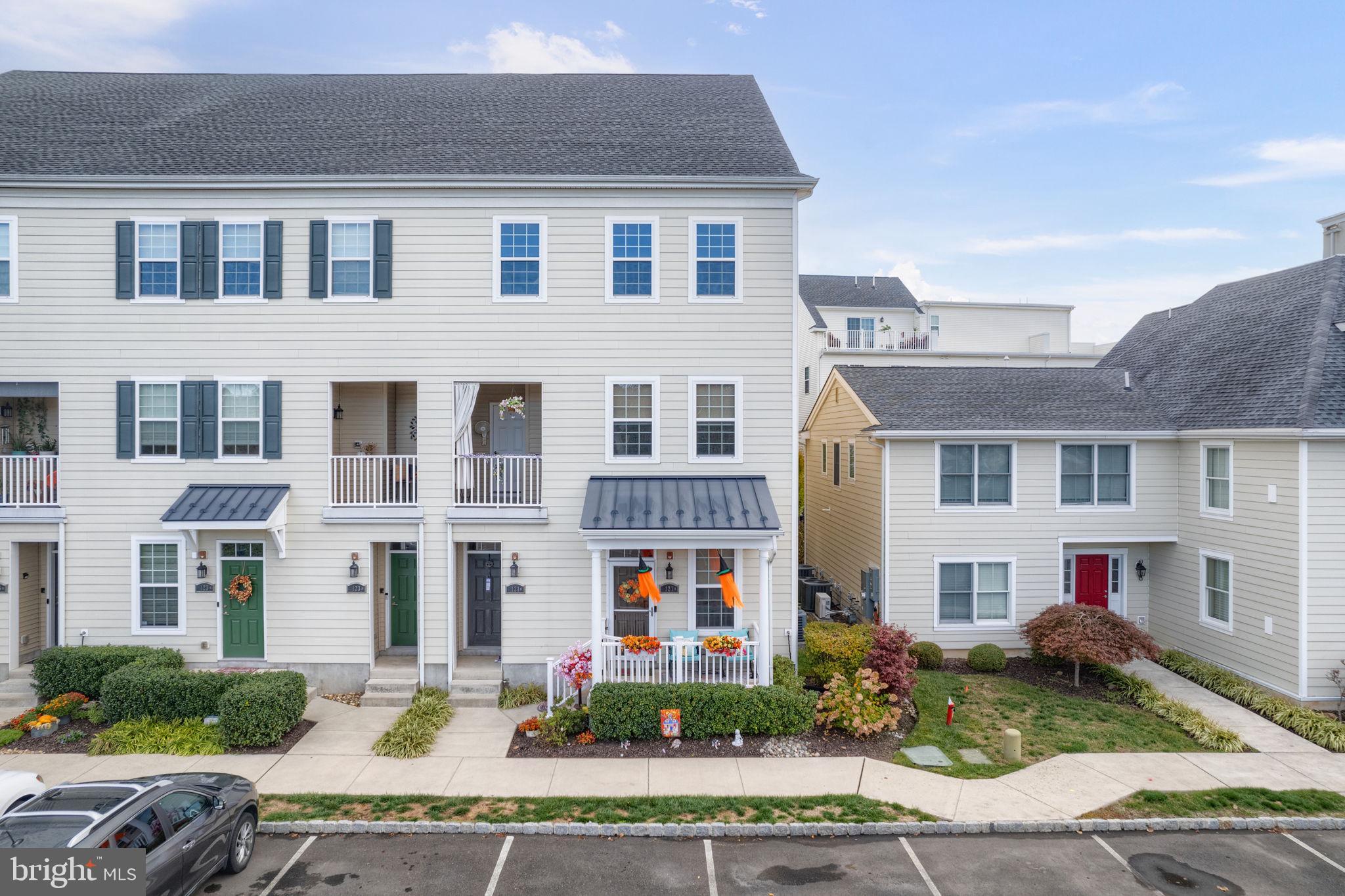 Like new End Townhome in great location in the Riverfront Community of Waterside. Unit is 1 block from River front park with views from Balcony. First floor entry from covered porch that has fully enclosed vinyl railings. Large family room off entry would make a perfect home office. There is a 7' x 5' storage closet that could be small office or computer room. Lower level also has large utility room that has laundry area with full size washer/dryer set that is included. There is also entry to rear oversize 1 car garage. From entry there are stairs to main level. Seller has installed top of line stair lift whether for convenience or necessity. There are newer top of line laminate flooring on stairs and most of main level. On main level there is large living room with access to balcony that has it's own large storage closet. There is good size dining area adjacent to kitchen that has granite breakfast bar. Kitchen features refinished cherry wood cabinets and granite counter tops with backsplash. The stainless steel appliances were upgraded 1 year ago, Large Whirlpool Refrigerator with double door bottom freezer. The Stainless GE gas range & oven, mirco-wave and dishwasher are only 1 years old and barely used. Kitchen has pantry closet and there in linden closet in hallway. Large full hall bath has custom vanity and tub/shower. Main bedroom is very good size with double closets. Very good size master bath with custom vanity and double shower. This home also has high efficiency gas heat, whole house humidifier, Utra violet light air cleaning system and water softener. Security system and Yale security code door locks. This beautiful like new home is in a great location large parking area outfront, easy access to mailbox and over space that can be used as dog park across the way Short walk to river park along the Delaware river. This home is an excellent value compared to the new construction units being offered. Come enjoy the magnificent views of the river and this warm feeling of this Waterside community. Available immediately.