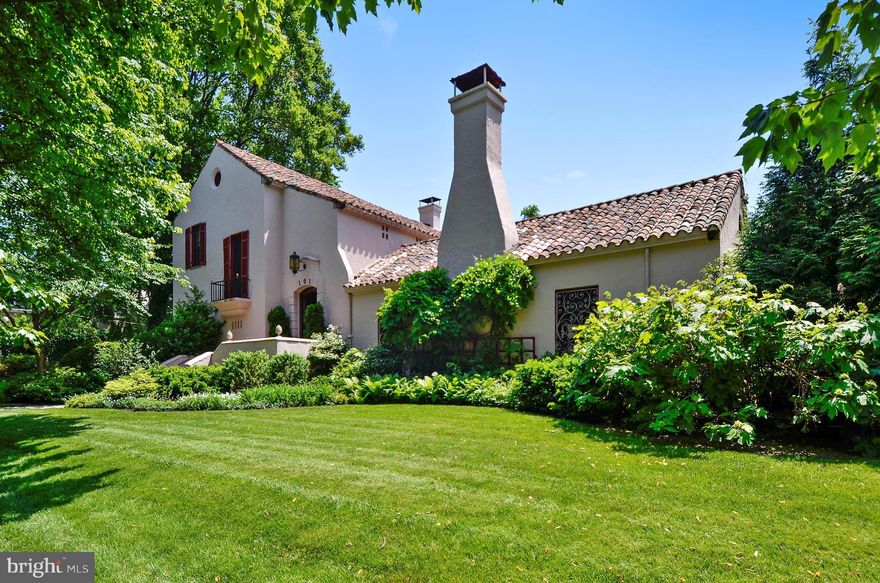 Beautiful Spanish Villa located in the heart of Guilford.  A rare gem, this wonderfully cared for home boasts hardwood floors, crown & chair-rail moldings and three gas FPs. French doors lead to an exclusive courtyard w/ an in ground pool and stone patio, perfect for entertaining. A separate lot is included as are impeccably cared for grounds. This is an outstanding property. Excluded DR fixtures.