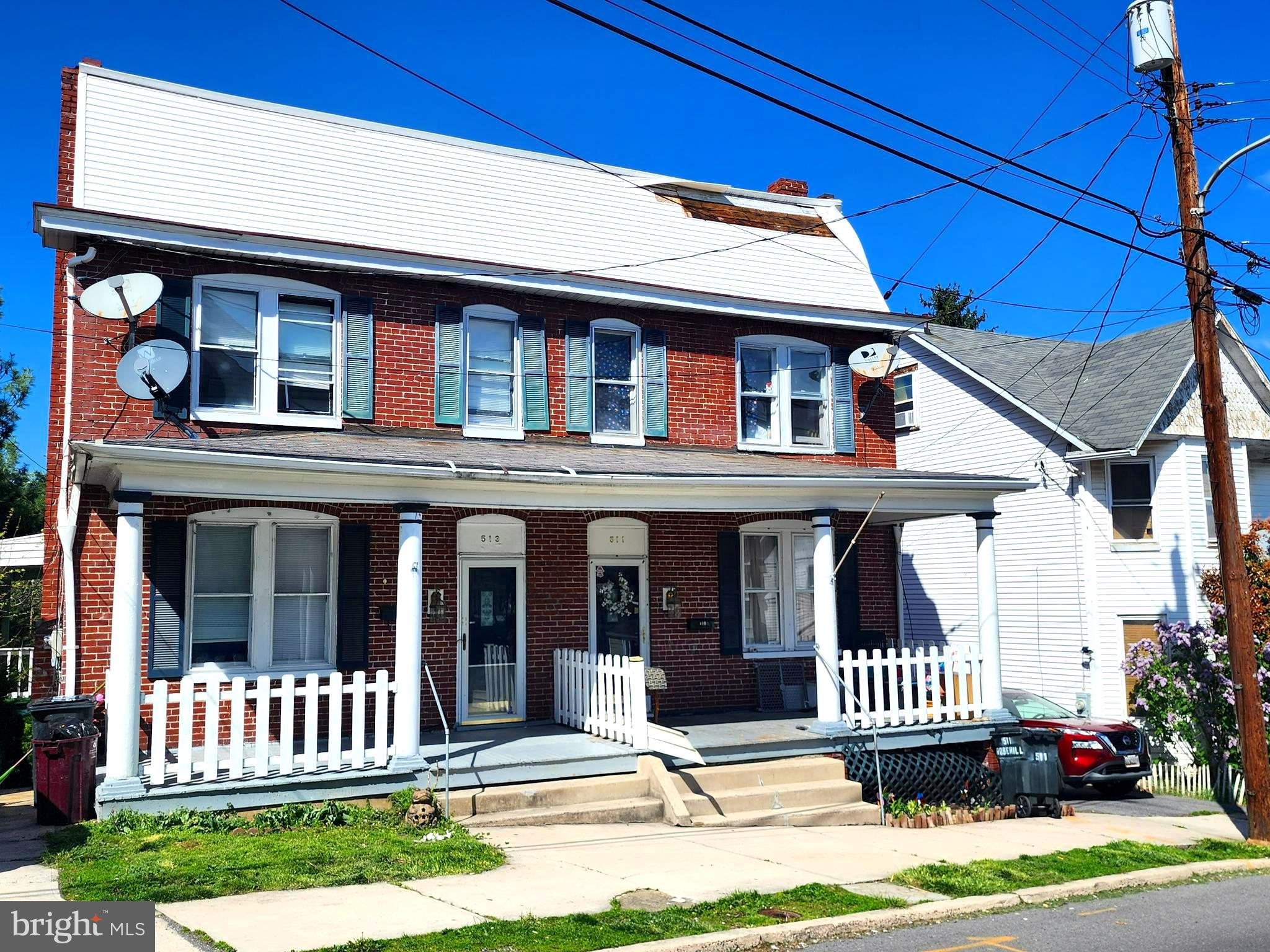 Attention investors, here's a fully rented duplex opportunity for you! This property consists of two units: 511 offers 3 beds / 1 full bath with a month-to-month lease at $895, while 513 features 4 beds/2.5 baths with a 1-year lease at $1,095. Tenants cover all utilities, which are separately metered. The duplex is situated on the west side and boasts a natural gas/radiator heating system, along with a nice rear yard and front, side, and rear porches. Its proximity to downtown, medical facilities, and restaurants makes it an attractive investment. Ready to expand your portfolio? This could be the perfect opportunity for you! Call today to schedule a tour. Tenant occupied , so 24 hour notice is required. Note: Strong winds loosened the vinyl siding near the top of structure. THIS WILL BE REPAIRED!