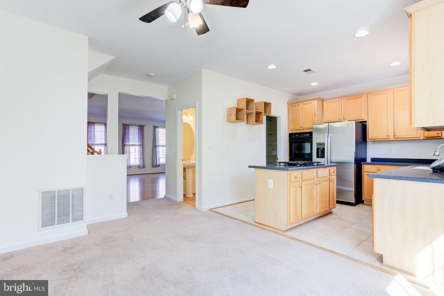 This gorgeous 1 car garage townhome in highly desirable Broadlands South is move in ready.  It's light filled, spacious, has an open concept and is neutral throughout.  It features hardwoods, ceramic, vaulted ceilings, deck, walkout basement with fenced back yard, etc., etc.  Community amenities abound.  It's minutes to the airport, metro, shopping, restaurants, etc.