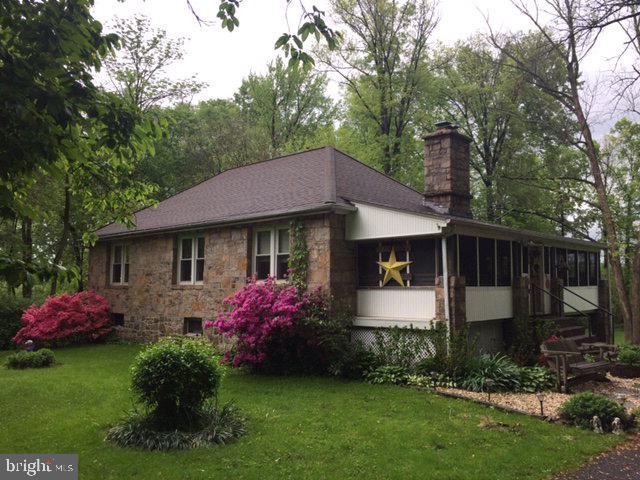 Riverfront in Marysville, 3 Bedroom, 1 Full Bath home sitting on 3.11 acres. Home is situated at the Historical Rockville Bridge. Solid stone home with vinyl tilt in windows and a large wrap around screened in porch. Imagine enjoying sitting on the porch or entertaining family and friends. Living Room features a gas fireplace for additional heat. Additional storage under the deck for lawn equipment and patio furniture storage. Home is perfect for the fisherman walk out your back door and enjoy direct access to the river.