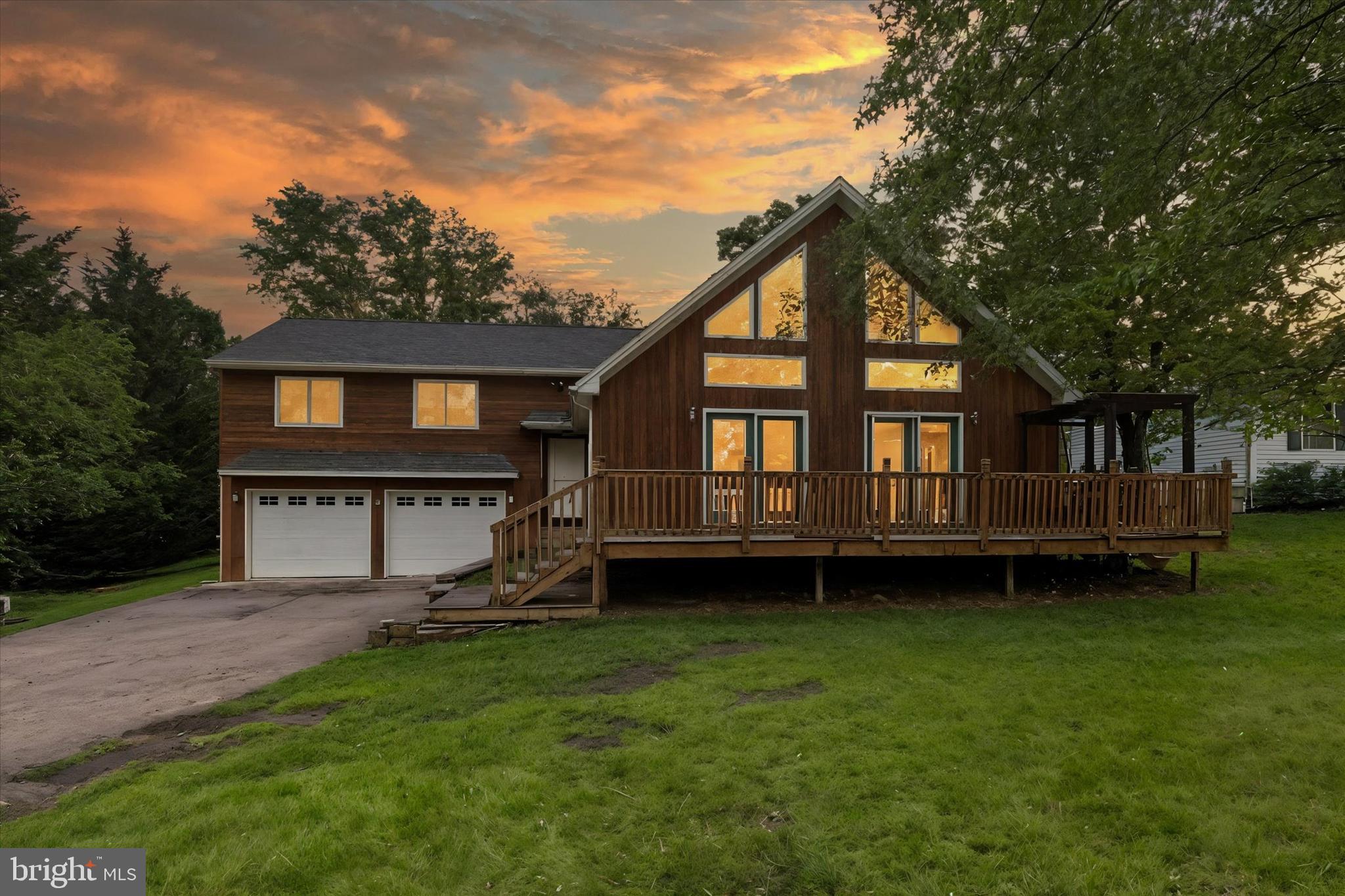 Welcome to Your New Home at Lake Meade!
Experience Lake Life in this custom-built Cedar home at Lake Meade!
Don’t wait for the feeling of waking up every morning to the serene beauty of nature right outside your window and just a short walk to a rec area by water where you can store your power boat and kayaks!
This spacious home features four bedrooms and three bathrooms, offering ample space for your family and guests. Each room is thoughtfully designed to maximize comfort and functionality, ensuring that every corner of your new home feels inviting and cozy. The master suite is a true retreat, offering a private sanctuary where you can unwind after a long day and indulge in the steam bath. Wake up to walking out on the private rear deck and enjoy your morning coffee and reflections as you get ready for a new day!
But that's not all—Whether you're envisioning an in-home private office, a fitness room, or a creative studio, these versatile spaces are ready to bring your dreams to life.
The open concept living area is perfect for entertaining, with ample space for gatherings with friends and family. Large windows throughout the home flood the space with natural light, creating a warm and welcoming atmosphere.
Step outside and you'll find yourself immersed in the beauty of Lake Meade. The outdoor living areas are designed to enhance your lakeside experience, featuring spacious decks where you can relax, dine al fresco, or take in the stunning views. The landscaped yard provides ample space for outdoor activities and gardening, allowing you to enjoy the great outdoors from the comfort of your own home.
Living at Lake Meade means you'll have access to a range of recreational activities, from boating and fishing to hiking and biking. The community here is vibrant and friendly, with a variety of events and amenities that make it easy to connect with your neighbors and enjoy a fulfilling lifestyle.
Welcome to Lake Meade, your new home in a place where natural beauty meets modern comfort. We are thrilled to have you as part of this wonderful community and look forward to seeing all the memories you'll create here.