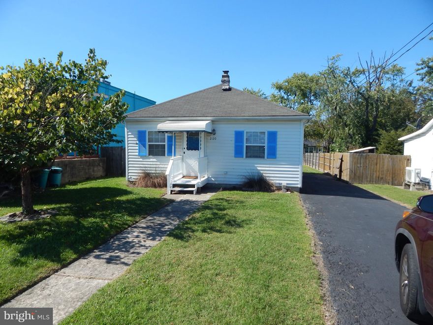 Beautifully renovated Home in the heart of Sparrows Point.  This 2 bedroom, 1 full bath home features a huge open floor plan highlighted by a brand new hardwood floor.  Large kitchen with plenty of cabinet space.  Brand new ceramic tile bathroom.  New carpeting and fresh paint add brightness to this wonderful home.
The large driveway will accommodate many cars and a boat or camper.  Big, privacy-fenced-in backyard is perfect for bar-b-ques or entertaining family and friends.  Come visit and you will call it home!