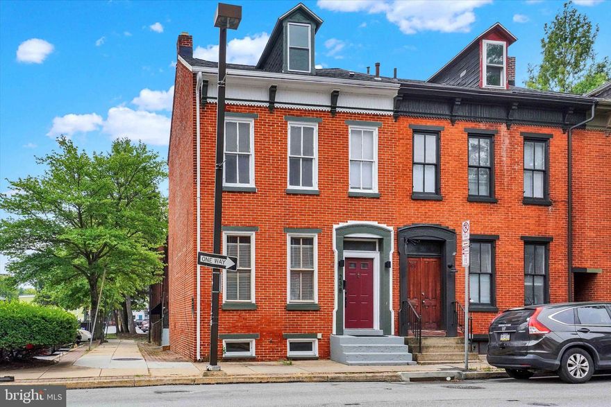 Welcome to 238 W Philadelphia Street — a beautifully restored 3-bedroom home (plus a finished attic that can serve as a 4th bedroom) with 1.5 baths, located in the heart of downtown York. This move-in-ready row home blends timeless charm with modern upgrades and sits just steps from local restaurants, parks, and city amenities. Inside, you’ll find a brand-new kitchen with quartz countertops, a fully remodeled bath featuring a custom tile shower, and fresh carpet and LVP flooring throughout. The main level includes convenient laundry, and updated mechanicals provide peace of mind. Outside, enjoy a spacious rear yard and off-street parking. This is a rare opportunity to own a turn-key property in one of York’s most walkable and vibrant neighborhoods.-Back on the market — no fault of the seller! The previous buyer’s financing fell through due to a job change.