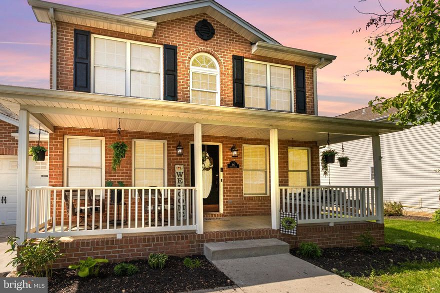 NEW PRICE AND AVAILABLE FOR IMMEDIATE MOVE-IN!!   This stunning, 2-car garage,  brick colonial is ready for its new owner.  The seller has done so many upgrades within the past few years! Beautiful landscaping with lavish plants/flowers, the front porch boasts a porch swing with reinforced hardware and low-maintenance vinyl railings. The house has been freshly painted, with new light fixtures,  new thermostats, a new refrigerator with a beverage center, new water heater elements, a whole house humidifier, new shutters, and garage embellishments. The HVAC was just serviced and recharged. New 22x15 deck with stairs, awesome custom bar, and lighting! (Gazabo and bar do convey) Custom fireplace with shiplap, dry stacked stone, and extended hearth added in the family room.  The kitchen has 42” wood cabinets, a glass/stone tile backsplash with under-cabinet lighting, a breakfast bar area, and a pantry. Newly remodeled powder room on the main level with custom shadow box trim, mirror, and lighting. Beautiful separate dining room with chair railing and wainscot panels for those family get-togethers.  The primary bedroom with Tray Ceiling has a custom built-in LED Fireplace with a smart TV and Rustic Mantle, WIC  has a custom-built Wood Closet & Rod System.  The primary bath has refinished vanities with custom glass/stone tile in the shower and bath.  Relax and enjoy the jetted tub after a long day. New Laundry Room with utility sink,  custom built-in stacked front load Samsung High Efficiency/ Large Capacity/ Washer Dryer (Purchased 2023) that does convey. New Flooring in Laundry and Upstairs Hall.  The basement is fully finished with a half bath, ready to add a shower.  Currently set up as an in-law suite that can be used as a possible 4th bedroom. Huge, two-car, oversized garage with custom-built tool storage organizer and two upper-level storage systems.    Driveway with ample parking for 6 vehicles. It is conveniently located to 81, VA, and MD.