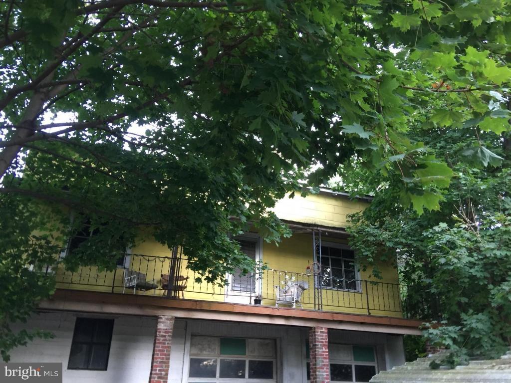 Nice sized lot with some trees. Outside the city. Home is a real fixer upper - HANDYMAN SPECIAL!