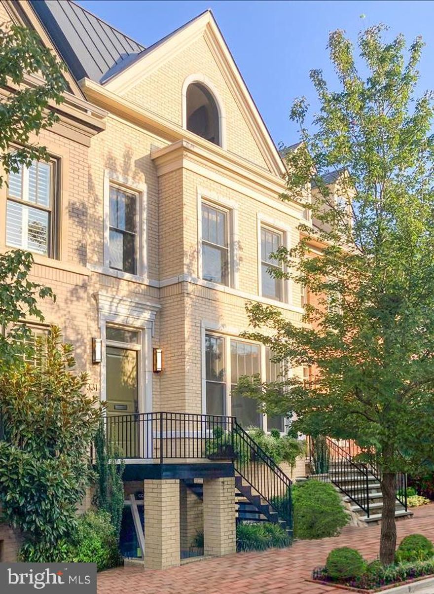 Modern convenience in historic Old Town! This 5 bed, 5.5 bath TH is ideal for town living, with 2 off-street parking spaces, electric car charger, and solar! Boasting over 3900sf, and only 3 blocks from both King St. and the Potomac River, it’s perfect for entertaining. 9ft ceilings, recessed lighting, built-ins, and crown molding, give an elegant feel to this open space. Enjoy 2 gas fireplaces, hardwood floors, and high-end appliances. Private patio leads to 2 off-street parking spaces. Level 2 hosts the primary suite, where you can enjoy sunrise from your private deck. 2nd bedroom also on this level. Bedrooms 3 & 4 are on 3rd level- one with a charming balcony. Take the elevator to the basement level, where you’ll find a rec room (full egress), a full bathroom, and the 5th bedroom.  3 sumps w/ battery back-up. Added features include: solar arrays/system, electric vehicle charger, wine refrigerator, built-ins, whole-house water filtration system.