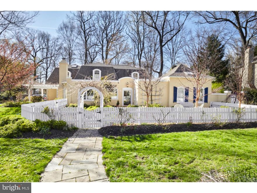 The South of France in Wayne! Just available and only after an extensive reconfiguration, remodeling, refinishing and expansion! This French-inspired home is best defined by its charm, sophistication and quality even for today's most discerning buyer. Outside, the house delivers an enchanting and inviting curbside presence. Picket fencing, arbors and pergolas complement incredible gardens; any garden lover's paradise. There's a private and expansive brick terrace as well as pea gravel, flagstone and brick walkways; a treat for any homeowner or guest. The interior offers a highly functional and flexible floor plan not to mention its "Piece de Resistance", a highly desirable first floor master suite!  The finishes and appointments throughout the home are characterized by high quality and superior appointments found are throughout. The entire interior and exterior have been mindfully reworked and the end result is top notch. Enjoy well appointed rooms, with lovely millwork, an abundance of recessed and accent lighting.  Glorious windows grace the rooms!  Affordable taxes and HOA fees make this property a compelling choice for the downsizer conscious about ongoing carrying costs. The home offers a truly lovely warmth and level of detail not easily found elsewhere.  Further, it is well located in a desirable neighborhood and in close proximity to shops and dining in Wayne as well as easily accessible to 76 to easy commuting into Center City. A wonderful townhome or carriage house alternative! Schedule your appointment today!