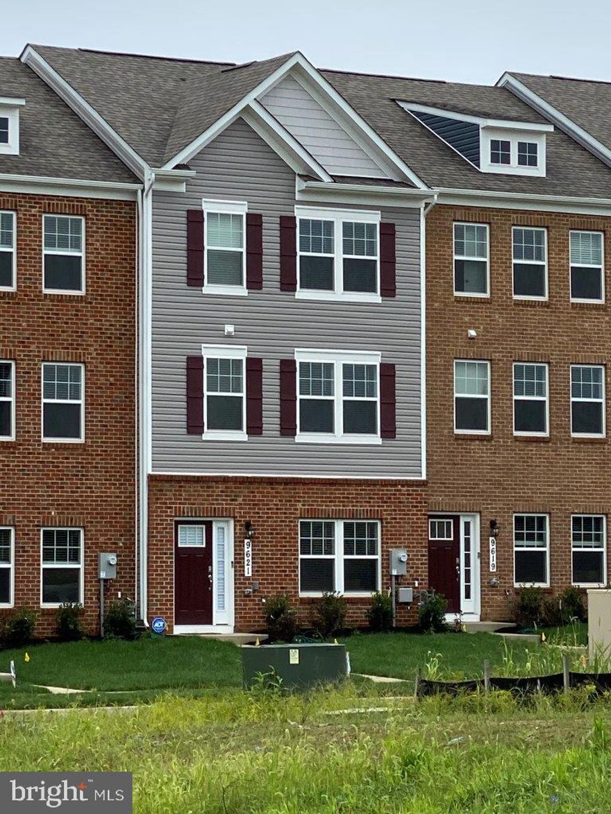 This Town home located near opened green space is situated near privacy. This Columbus townhome offers1,962 square-foot, with 3 bedrooms, 2.5 bathroom, an 18x6 DECK INCLUDED and 2 car rear loading garage. This home is spacious and features an open living concept. The main level features a middle island kitchen with Stainless Steel Whirlpool kitchen appliances with 5-burner gas range, upgraded White Cabinets and Quartz counter tops. Hard surface flooring on whole main level. The third level has a gorgeous owners suite with a large walk-in closet and features a luxury owners shower with Quartz counter tops. Two secondary bedrooms, upper level laundry hook up, and hall bathroom with Quartz counter tops. There is plenty of space for entertaining family and friends in your finished lower level rec room.  This home is also equipped with smart home technology. The package includes a keyless entry, Skybell (video doorbell), programmable thermostat to adjust your temperature from your smartphone and much more. Commuting and traveling is made easy with quick access to 1-495, Route 5 and to the Washington DC area.