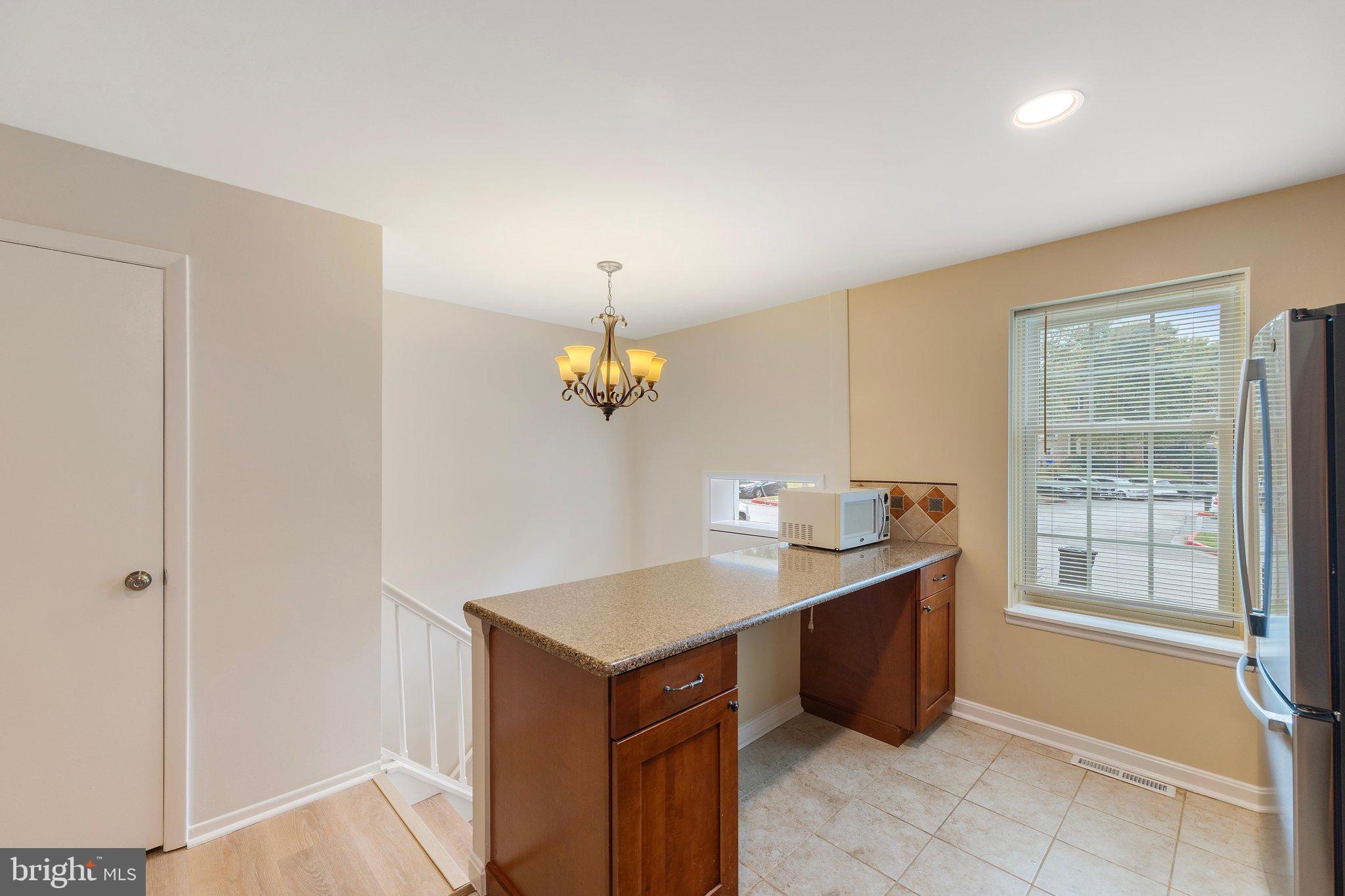 9810 RAINLEAF COURT