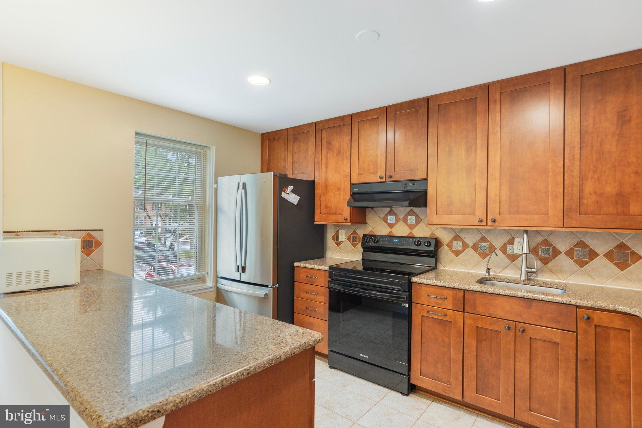 9810 RAINLEAF COURT