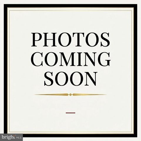 Photo of 10115 Seattle Slew Lane #18, LAUREL, MD 20723 (MLS # MDHW2067824)