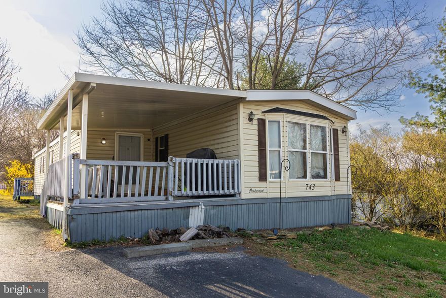 Welcome to 743 Shawna Ave!  
This truly unique mobile home is a rare find — a “one-and-a-half” sized model that offers exceptional space and versatility.  
Inside, you’ll enjoy a bright, open layout with thoughtful features throughout. The home includes two spacious bedrooms and two full bathrooms, with the primary suite featuring a relaxing soaking tub and a standalone shower.  
Additional highlights include a dedicated utility room with generous storage, an extra refrigerator, and washer and dryer hookups. The comfortable living room has a cozy gas fireplace for cold winter nights. The dining area is perfect for gatherings and entertaining.  
The kitchen comes well-equipped with newer appliances, including a gas stove, side-by-side refrigerator, and dishwasher. Recent updates also feature a newer asphalt roof and a newer heating and air conditioning system with warranty, giving you peace of mind for years to come. Plus, water is included in the park rent, adding extra value.  
Step outside to enjoy both front and rear porches, a separate entrance to the backyard, and a lovely yard ideal for outdoor relaxation or socializing.  
Don’t miss your chance to own this one-of-a-kind home
ALL CONTRACTS ARE SUBJECTED TO PARK APPROVAL!