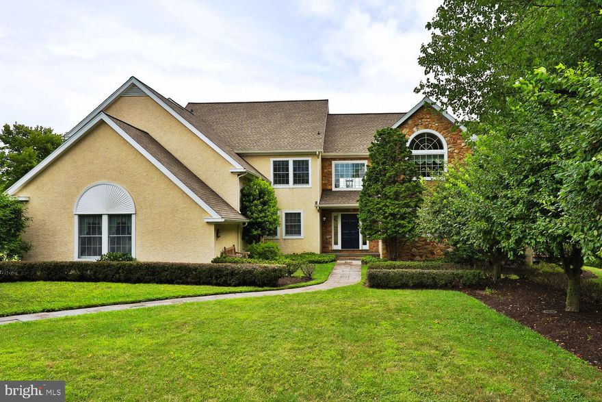 Situated on four acres in the heart of Worcester Township, this custom design & built
transitional style residence offers a blend of elegance and functionality at every turn. A
tree-lined drive leads to the impressive entrance, where a grand foyer with a floating
staircase sets the tone for the home’s sophisticated ambiance to welcome you.
To the right of the foyer, you will discover the formal rooms including a first-floor home
office with bespoke cabinetry, a dining room boasting picturesque views of the sprawling
meadow, and a charming light filled living room with a wood burning fireplace and access
to the lovely wrap around porch.

On the left side of the foyer, the family gathering spaces unfold, featuring a spacious kitchen
and breakfast area overlooking the vaulted family room which showcases a wood-burning
stone fireplace, custom cabinetry, and an access to the deck. The laundry room with a
laundry chute, a powder room, a mudroom with access to the driveway, garage entryway,
and a back staircase leading to the upper bedrooms and lower level complete the informal
first floor plan.  Descend the staircase to the amazing lower level where entertainment awaits or could
possibly be easily transformed to an in-law suite.  A well-appointed bar/kitchenette with
custom cabinets and a beverage fridge complements the expansive great room with ample
space and seating, a pool table, and a full gym. Radiant floor heat enhances the impressive
full bath, while a large workshop, storage area, and utility room provide practical spaces.
Floor-to-ceiling windows and a door flood the area with natural light and offer views of the
meadow and another door opens in close proximity to the large bath which could serve as
the “bath house” for a future pool.

The second floor hosts the primary suite, featuring a second home office/sitting room with
a private deck, the bedroom with dual walk-in closets, and a luxurious bath with a Jacuzzi
tub, dual vanities, and a spacious stall shower. Across the landing are four sizable
bedrooms each offering generous closet space with built-in dressers, and a hall bath.
Ascend to the third level via the back staircase to discover an amazing private guest suite
with a full bath, cedar closet, and expansive views of the back meadow.. Additional attic
space provides ample storage.

Noteworthy features of this exceptional home include beautiful first-floor red oak
hardwoods, 8.5-foot-high ceilings, and handsome millwork and cabinetry.

This hilltop home is on a corner lot bordered by the Zacharias Creek affording a rare
combination of privacy and beautiful views of the surrounding landscape. Enjoy easy
access to Heebner Park, the walking trails, proximity to the PA Turnpike and other main
roadways. This property is in the highly regarded Methacton School District.

Please watch the Virtual Tour to preview this beautiful property - look for the movie camera icon above.