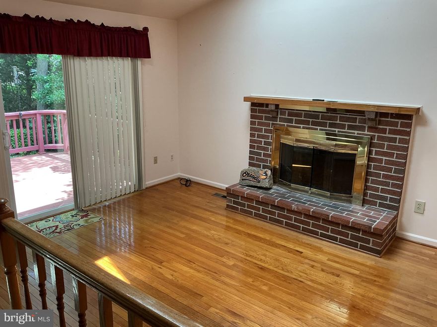 Welcome to 285 Shakespeare Drive in Severna Park — a beautifully maintained 3-bedroom, 1.5-bath home located in a desirable water-privileged community. The main level offers a bright living room, dining room, and kitchen that opens to a cozy family room with a gas fireplace and a convenient half bath. Upstairs, you’ll find two spacious bedrooms, another smaller bedroom, and a full hall bath. The unfinished basement and crawl space provide excellent storage options. Step outside to the stunning backyard, filled with lush, mature landscaping — perfect for relaxing or entertaining.  Walk out of the family room onto a large Trex Deck to enjoy the landscaping. Enjoy community water access with a private boat launch, combining comfort, charm, and coastal lifestyle in one ideal location. Plenty of storage space in the basement fully cleaned.
