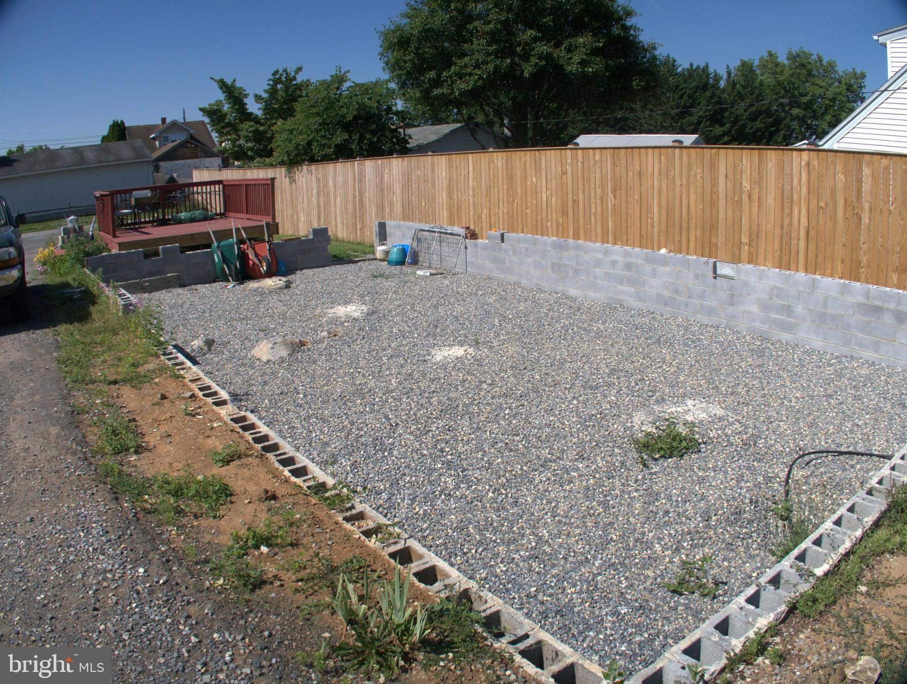 Perfect opportunity for a builder or buyer looking to build! This property was burned down in January 2024. Everything is removed. This lot boasts the perfect size home site with an almost 1100 SQFT concrete foundation in place with certified letter. Foundation can be extended in the expansive rear of lot, if desired. Water, electric, and sewer ready to go. Nice deck and new privacy fence. Located on a secluded no through road. DON'T MISS THIS GREAT OPPORTUNITY!!!