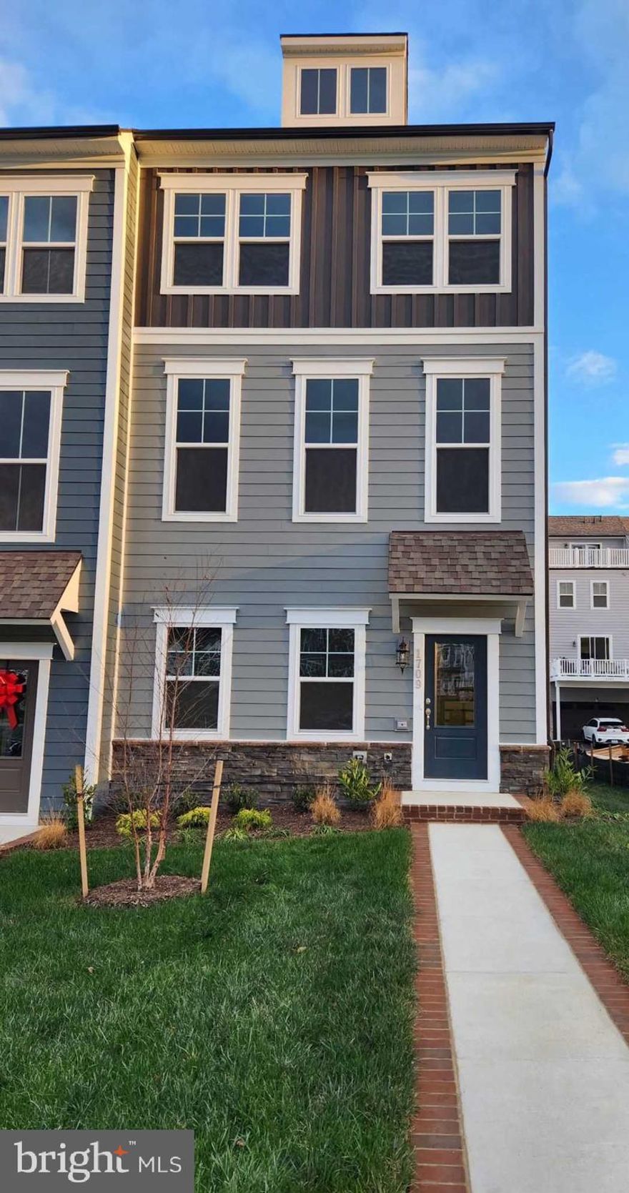 RENTAL OPPORTUNITY! 
Beautiful light filled 4 BR, 3.5 BA, end unit townhome featuring an open-concept floor plan, an expansive kitchen island that seats up to six, a large family room, dining room, and a 2 car garage. 10 ft. main level ceiling, and a 10'X18' deck off the main level dinning area.  Upper level includes the primary suite with a private en-suite bath and a large walk-in closet, as well as two additional bedrooms, a 2nd full bathroom and the laundry closet.  The 4th bedroom and 3rd full bath are located on the entry level.  Located in the amenities filled Potomac Shores community. Experience the endless opportunities to bike, walk, run, swim, golf, workout, canoe, boat, or enjoy a seat in front of the firepit at the Golf Club restaurant open to all Potomac Shores residents. Walk throughout the tree lined community on over 85 miles of wide paved trails. Take the VRE train (projected to be completed in 2026) to D.C. Enjoy the convenience of two of the three brand new schools that have been completed. Future town center on the water coming soon