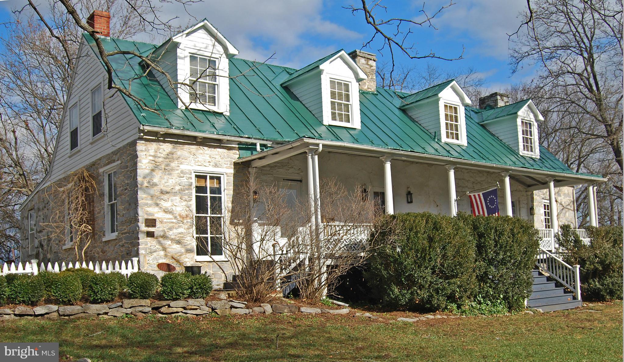 EXTRAORDINARY C 1742 White House Farm : Stone, 3300+sf, 4 br., 3.5 ba. home, immaculately restored. 59+ acres. UnrestrictedStone barn 4c garage, apt. ready above, Spring House, pond, 3 acres of board fencing. Stone fence. CW battle site. GREAT LANDSCAPING. Wood floors, limestone walls, wall mural of locale in DR.library, 3 frp. All systs updated. Private. JUST ABSOLUTELY LOVELY. PRICE DROP