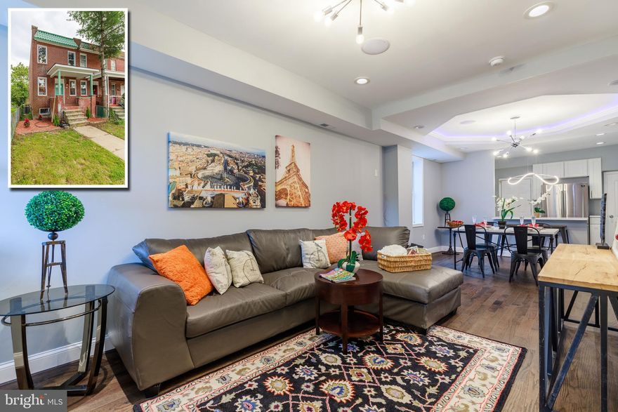 PICTURE PERFECT PORCH FRONT RENOVATION WITH 3 FINISHED LEVELS & DESIGNER FINISHES!  Open floor plan featuring hardwood floors throughout the main level, spacious living room, separate dining area w/ tray ceilings, designer kitchen w/ granite counters, ss appliances, and tile backsplash, convenient main level half bath, upper level w/ 3 true bedrooms and 1 full bath,  fully finished basement with a family room, 4th bedroom, and 2nd full bath!  Pack your bags and move right in!