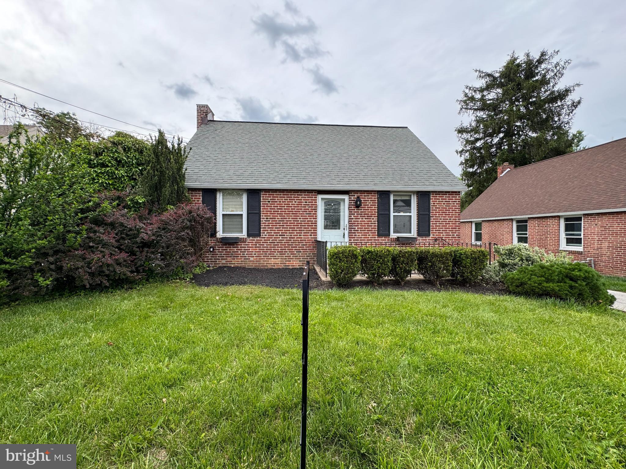 Welcome home! This adorable, move in ready, Cape Cod has been freshly painted and had new wall to wall carpeting installed! The front door opens into a spacious living room which leads to the eat in kitchen with access to the rear yard. The main, over sized bedroom is also situated on this floor along with a full hall bathroom.
The second floor offers 2 additional bedrooms and attic storage. The full basement provides an outside entrance for easy access. You will also find the laundry located on this level. Lots of potential to finish off all or a portion of this space as an office, work out room, TV room, etc. You decide! The large rear yard is great for BBQ's, gardening, lounging, you name it! All conveniently located close to shopping, schools and public transportation. This is the one!