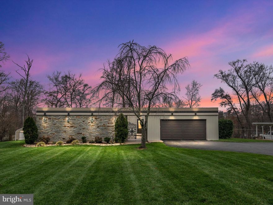 ***Sellers Prefer 60 day rent back*** Nestled in the serene landscape of Arnold, Maryland, 594 Shore Acres Rd epitomizes contemporary elegance and innovative design. This remarkable property boasts a strikingly unique architecture, encompassing a welcoming courtyard that leads to an oversized two-car garage, complete with a convenient kayak rack. The residence unfolds over a single level, featuring four well-appointed bedrooms and two bathrooms, offering a seamless blend of luxury and comfort. The heart of this home is its beautifully renovated kitchen, a masterpiece of design and functionality completed in 2014. Throughout the home, one can find tasteful upgrades that enhance its allure, including a sophisticated gas fireplace with its own thermostat, providing a cozy ambiance at your fingertips. The commitment to eco-friendly living is evident in the geothermal system installed in 2016 and the state-of-the-art gas water heater. Attention to detail is a hallmark of this property, from the radon mitigation system ensuring a healthy living environment to the reverse osmosis system for pristine water quality. The home's floors tell a story of their own, adorned with reclaimed Asian hardwoods, added in 2016, that exude a sense of history and character. The recent installation of new windows and sliders, along with solid wood doors, further accentuates the home’s commitment to quality and durability. This abode is not just a house; it's a sanctuary where sleek sophistication meets a warm, inviting atmosphere, creating a haven that is both vast and enthralling. Every element of 594 Share Acres Drive has been thoughtfully curated to offer an unparalleled living experience, making it a true jewel in Arnold, Maryland.