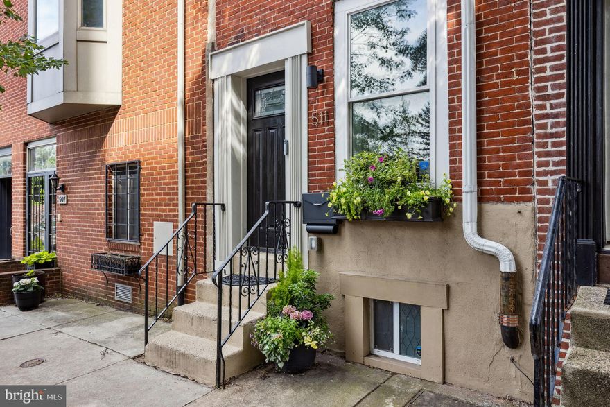 Welcome to 511 S. 27th Street, located in the highly coveted neighborhood of Fitler Square and the Albert M. Greenfield School Catchment.  This exquisitely remodeled home offers 3 bedrooms and 2 full baths with the perfect blend of charm and modern upgrades. The kitchen features timeless white subway tiles, pristine shaker cabinets, and stainless-steel appliances. Exit in the rear to your serene private patio, perfect for outdoor dining and relaxation. Step up to the second floor, where you will find two bedrooms and a full bathroom featuring contemporary finishes and a sleek glass shower door. The rear bedroom includes a murphy bed. The primary suite is located on the third floor and provides a spacious bedroom and a luxurious full bathroom. The private rooftop deck is an ideal setting for hosting gatherings or unwinding in seclusion. The fully finished lower level offers versatile space with new and comfortable carpets for lounging, a workspace, a home gym, or a playroom, limited only by your imagination. The laundry area is also located in the basement. Completely renovated in 2021, including new roof, HVAC, water heater, windows, and kitchen appliances. New Washer & Dryer in 2022. New Electric Panel. Simply Safe Security System. Seize this opportunity to reside just minutes from the University of Pennsylvania, CHOP, University City, Rittenhouse Square, and Fitler Square. It's all about location here as the home is just steps away from the Schuylkill River Trail, Playground, Tennis Courts, Dog Parks, O'Connor Pool, and Fitler Square Park.