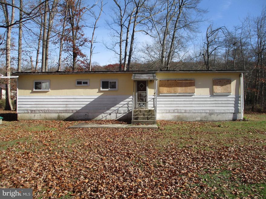 Mobile home located in the Deer Lake area with easy access to Rt 61.  This home sits on a .29 acres lot and also has a barn located on the property.  There is plenty off street parking for multiple cars.  There are 3 bedrooms, 1 1/2 baths and a main floor laundry area off the kitchen and side entrance.  There is a rear covered patio with access off the dining area.  This home offers immediate possession.